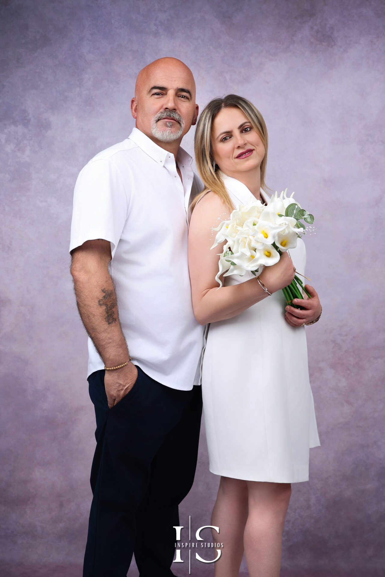 Happy family in an indoor photoshoot with Inspire Studios