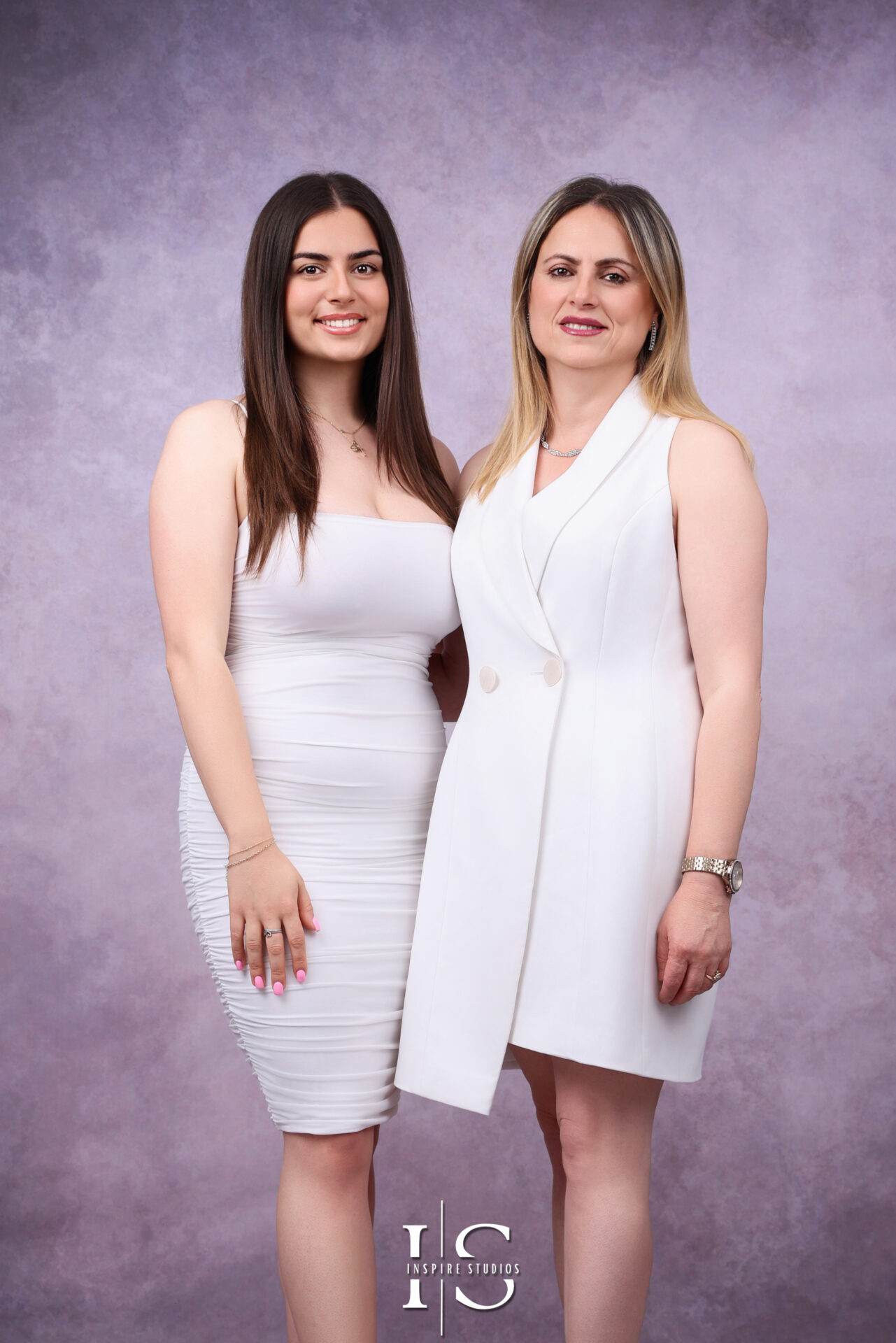 Happy family in an indoor photoshoot with Inspire Studios