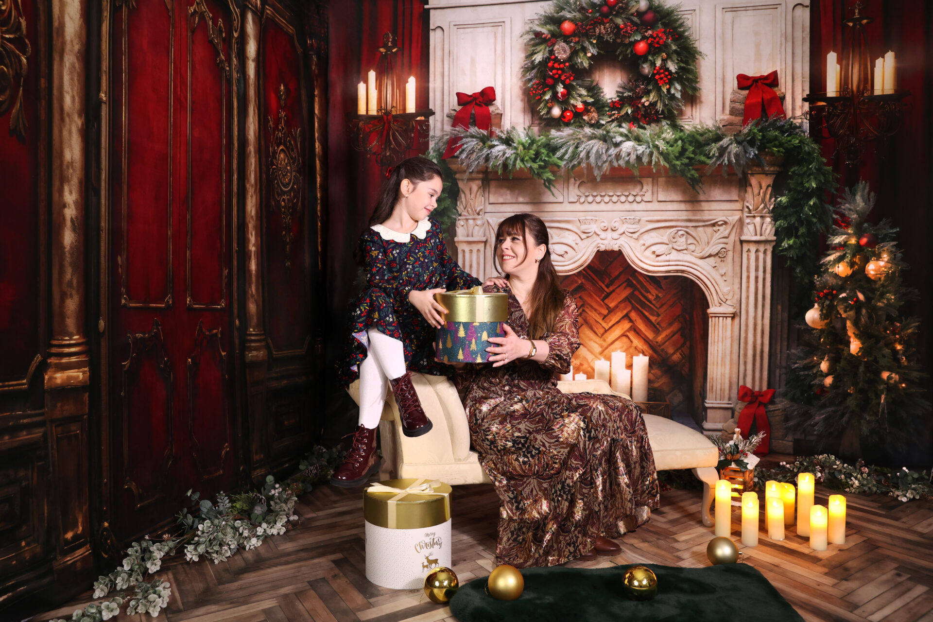 A cozy Christmas room with a classic fireplace, Christmas tree, and traditional red and green decorations.