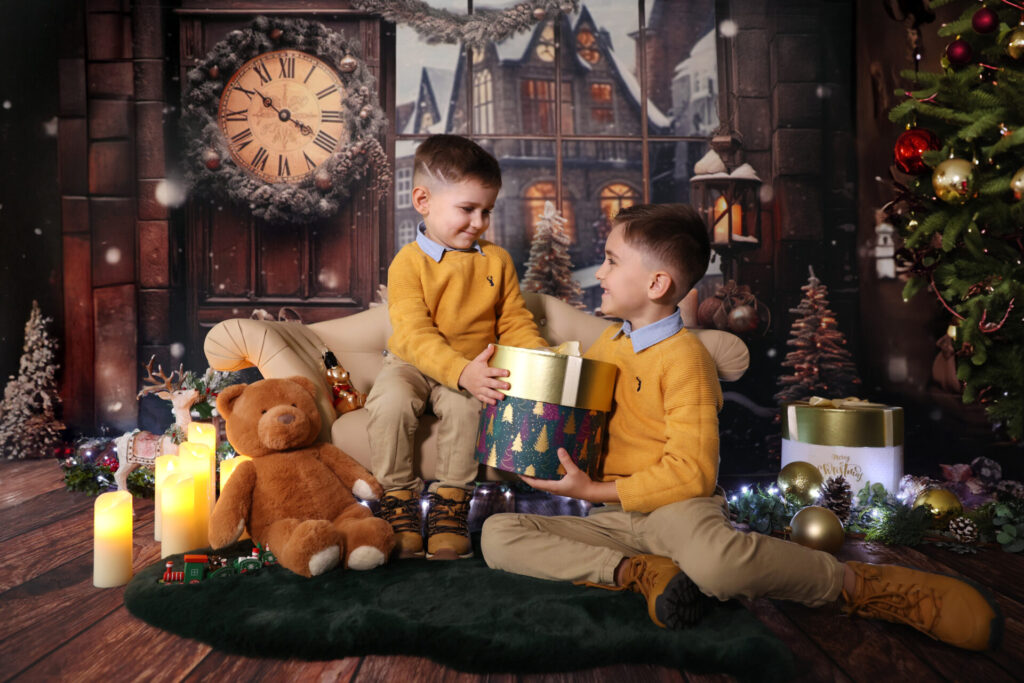 Elegant Christmas Eve photoshoot for children with a holiday decor.