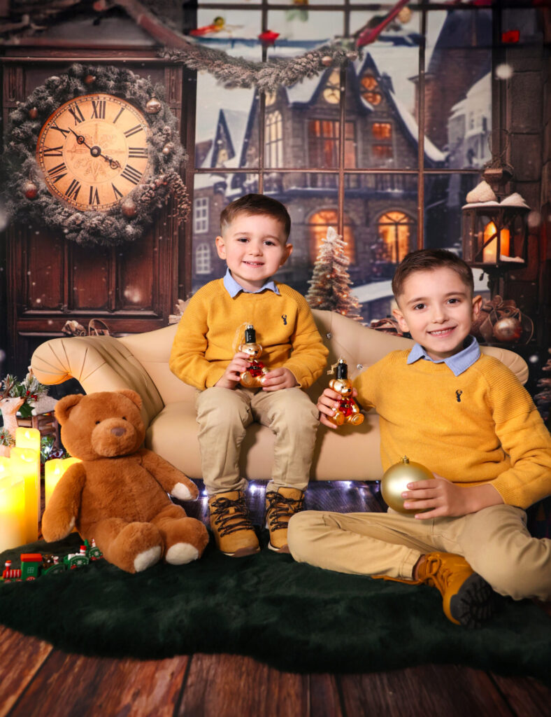 Elegant Christmas Eve photoshoot for children with a holiday decor.