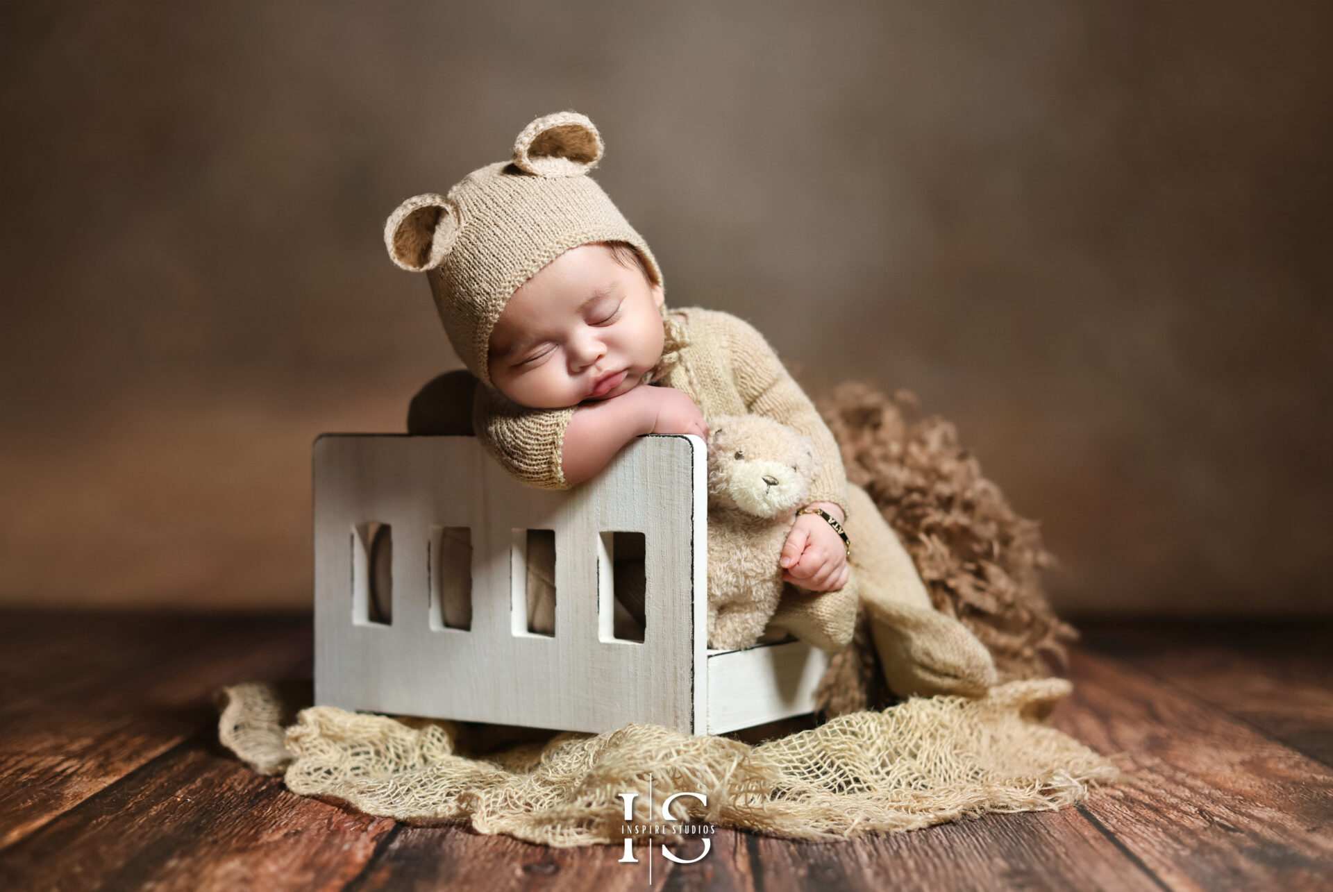 London Newborn Photographer capturing a newborn photo during a sessio in London studio.