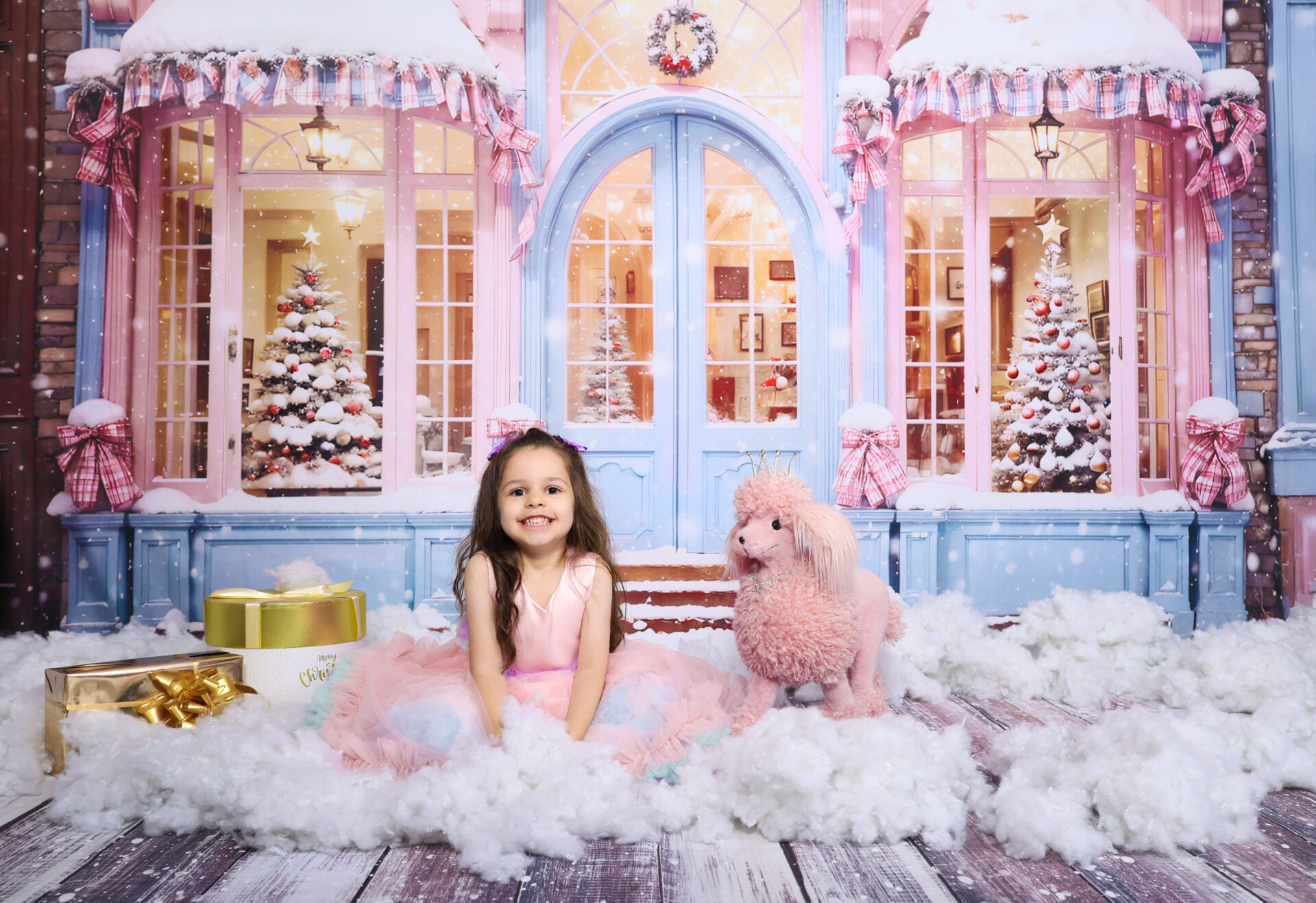 Fun and stylish Barbie's Christmas photoshoot backdrop with pink holiday decor and sparkling lights.