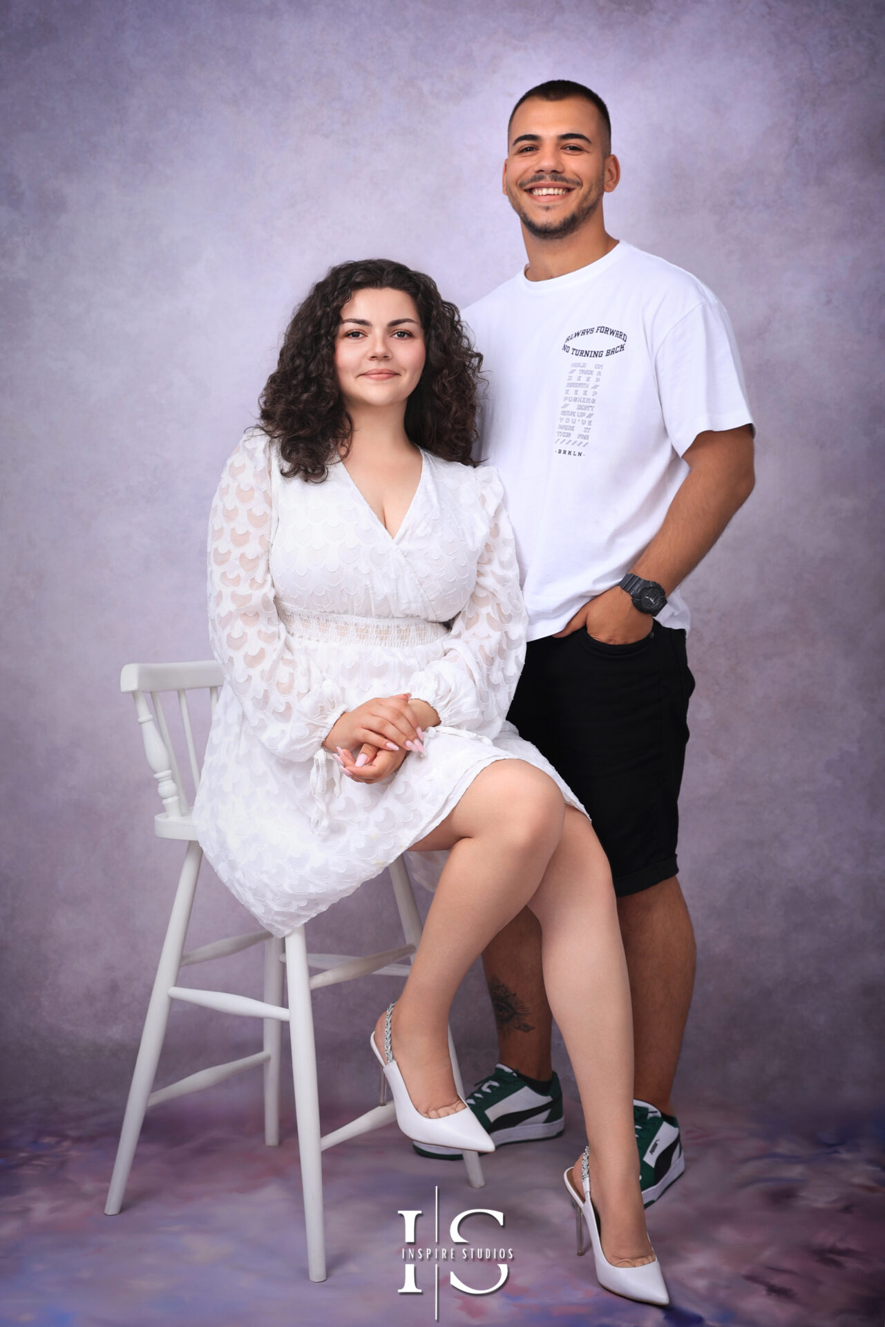 Romantic couple posing together in a couple photoshoot at Inspire Studios Walthamstow.