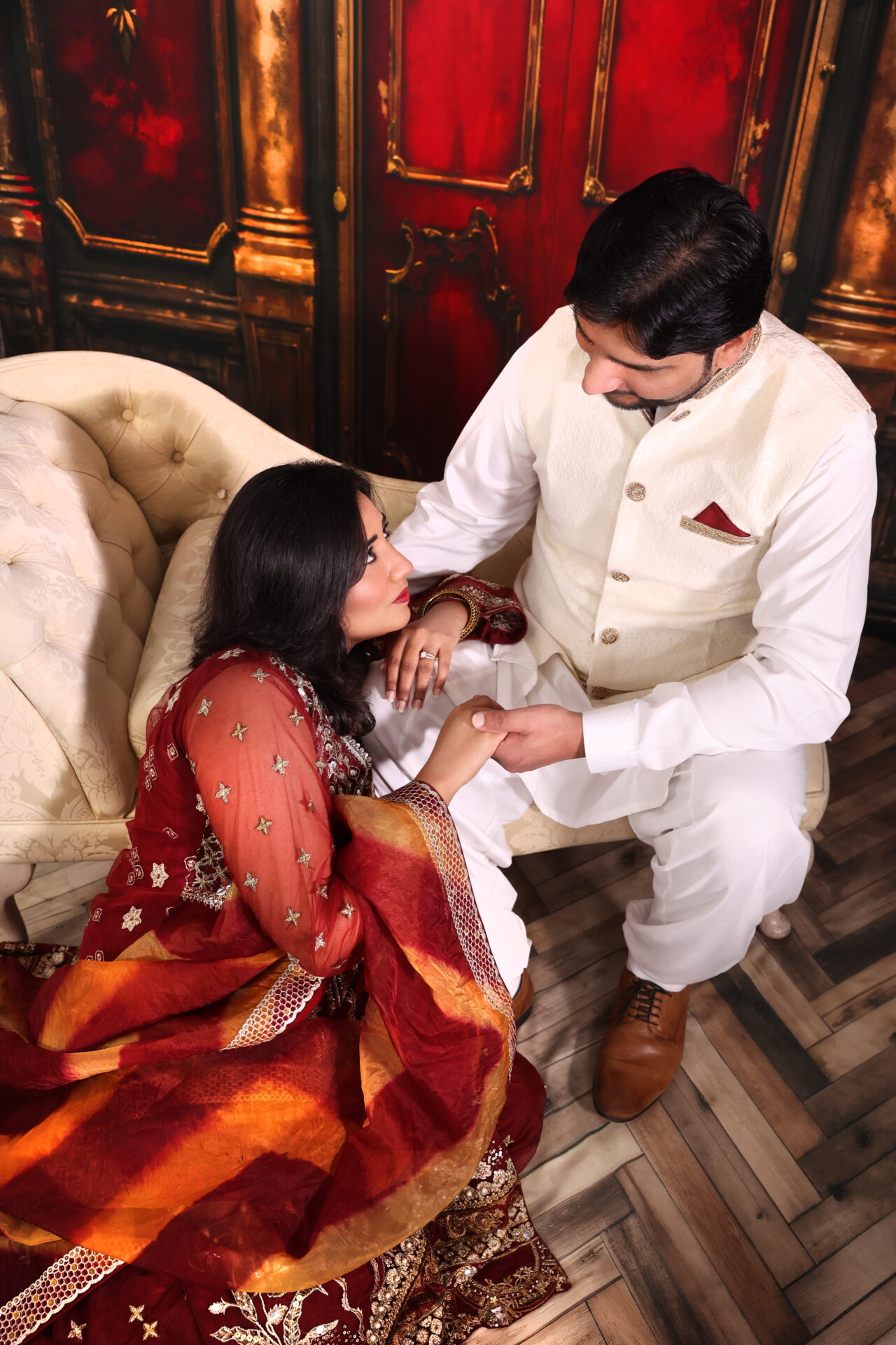 Pakistani couple posing together in a couple photoshoot at Inspire Studios Walthamstow.