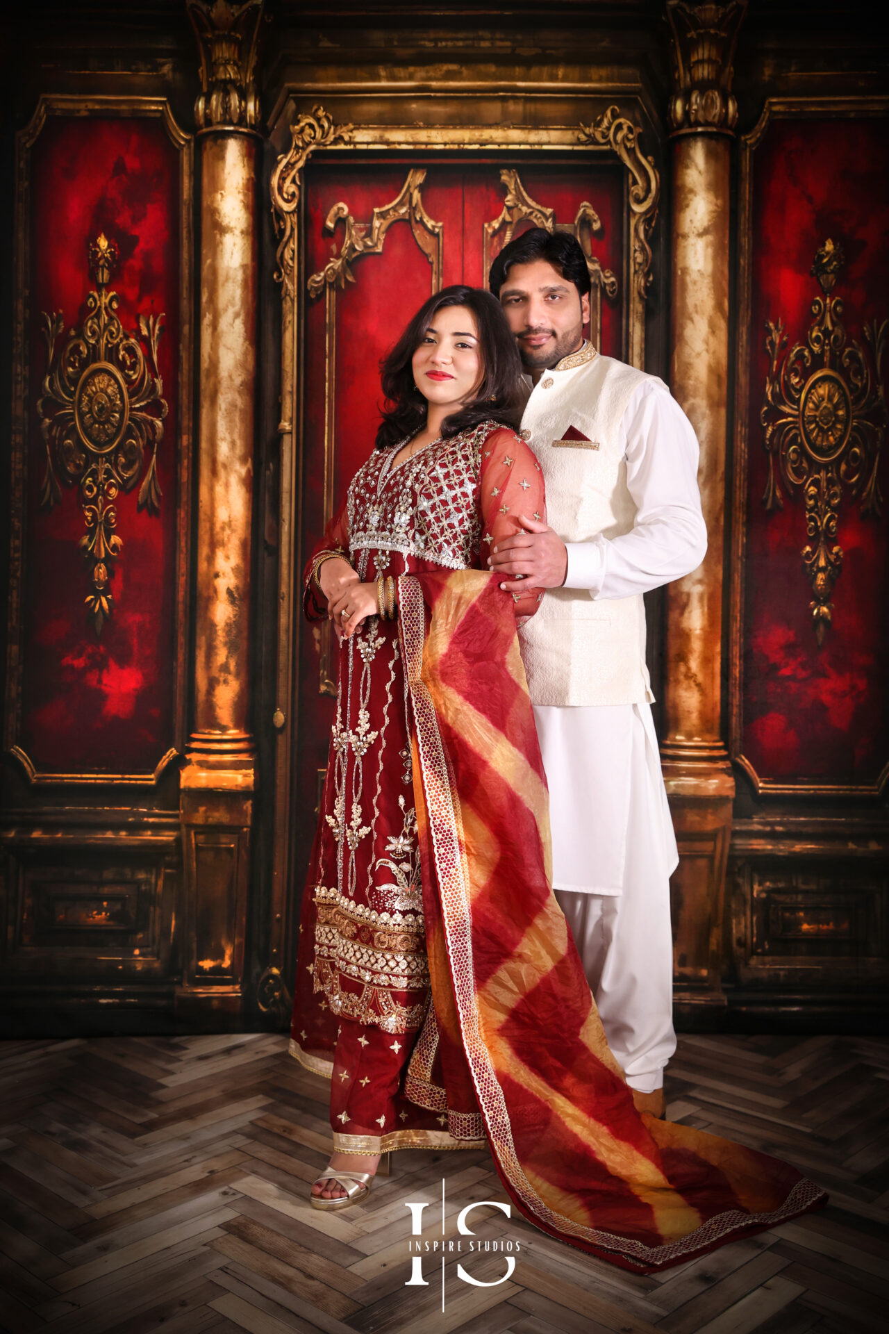 Pakistani couple posing together in a couple photoshoot at Inspire Studios Walthamstow.