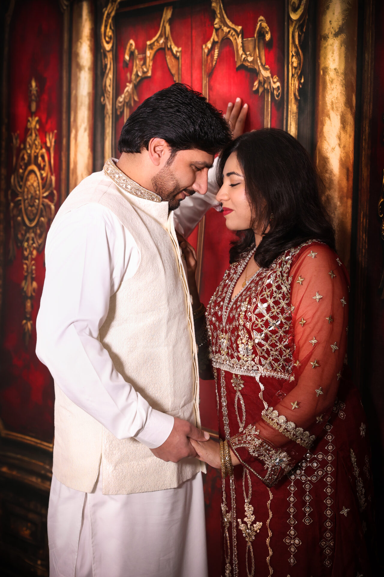 Pakistani couple posing together in a couple photoshoot at Inspire Studios Walthamstow.