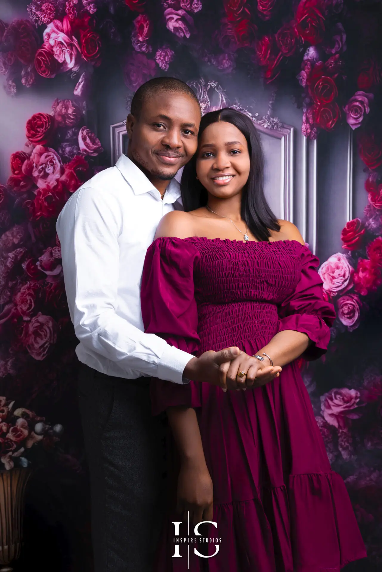 Romantic couple posing together in a couple photoshoot at Inspire Studios Walthamstow.
