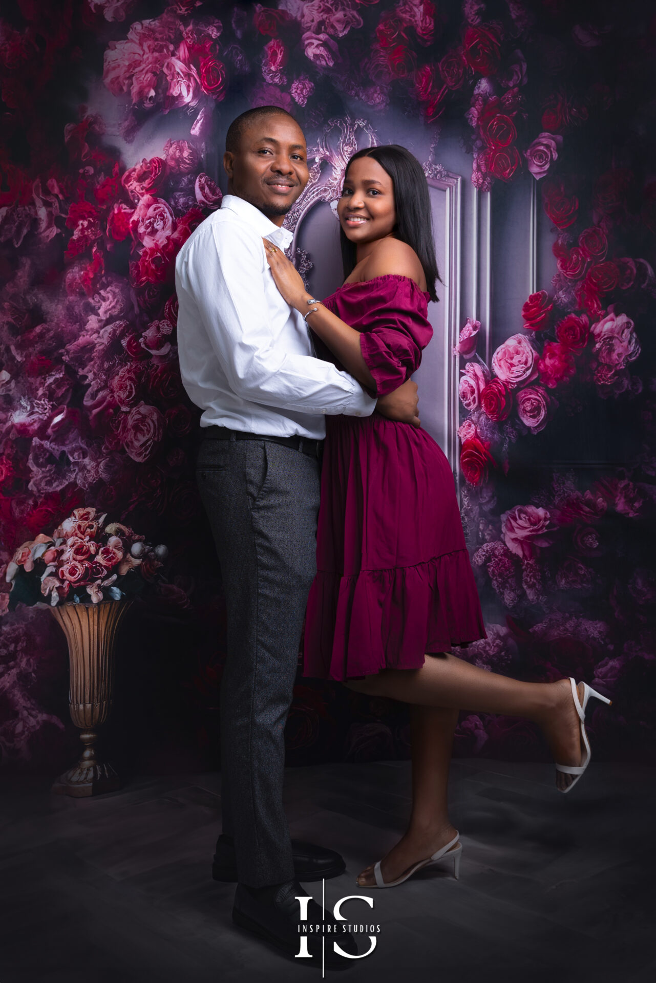 Romantic couple posing together in a couple photoshoot at Inspire Studios Walthamstow.