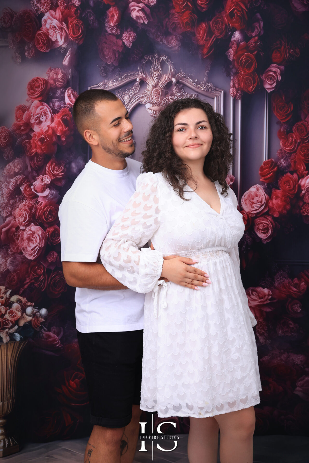 Romantic couple posing together in a couple photoshoot at Inspire Studios Walthamstow.