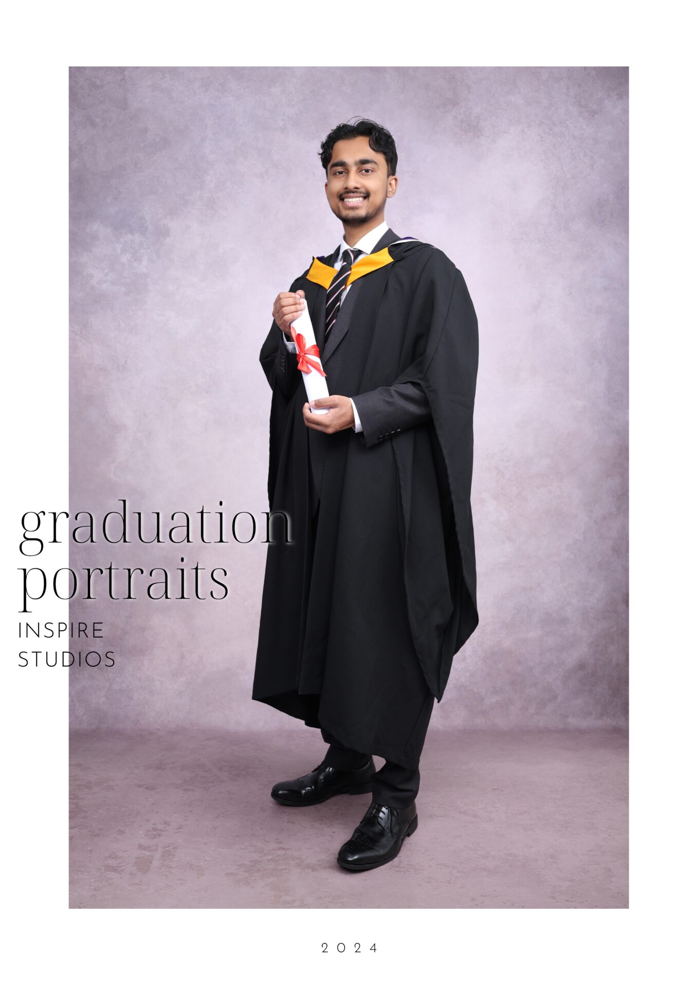 A student photo during a graduation photo session in studio.