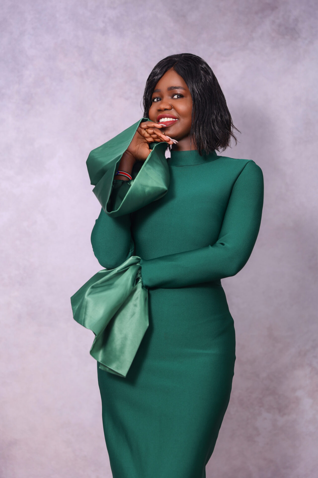 Woman elegant dressed posing during a birthday studio photoshoot in London.