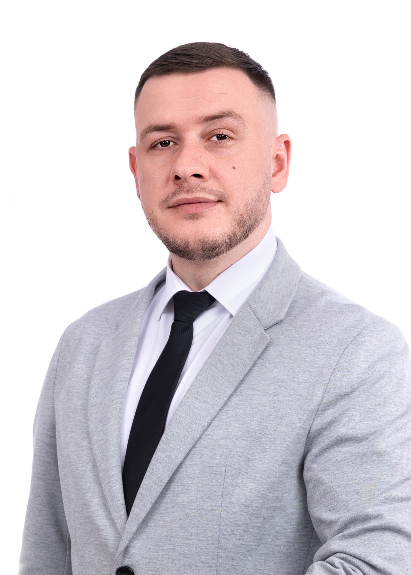 Professional linkedin profile photo during a headshot photo session in professional studio.