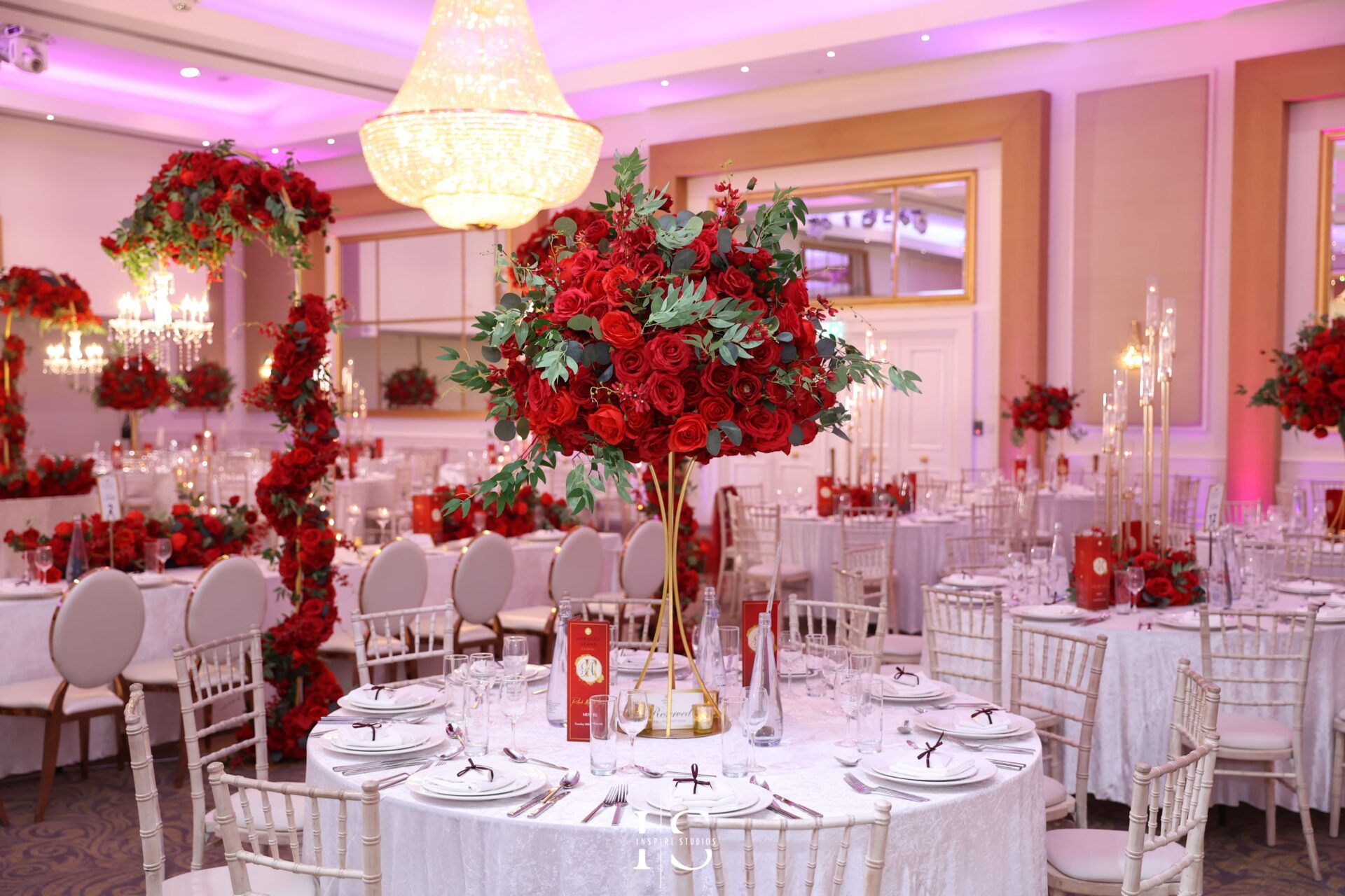 Beautiful table decorated with red roses at Meridian Grand venue.