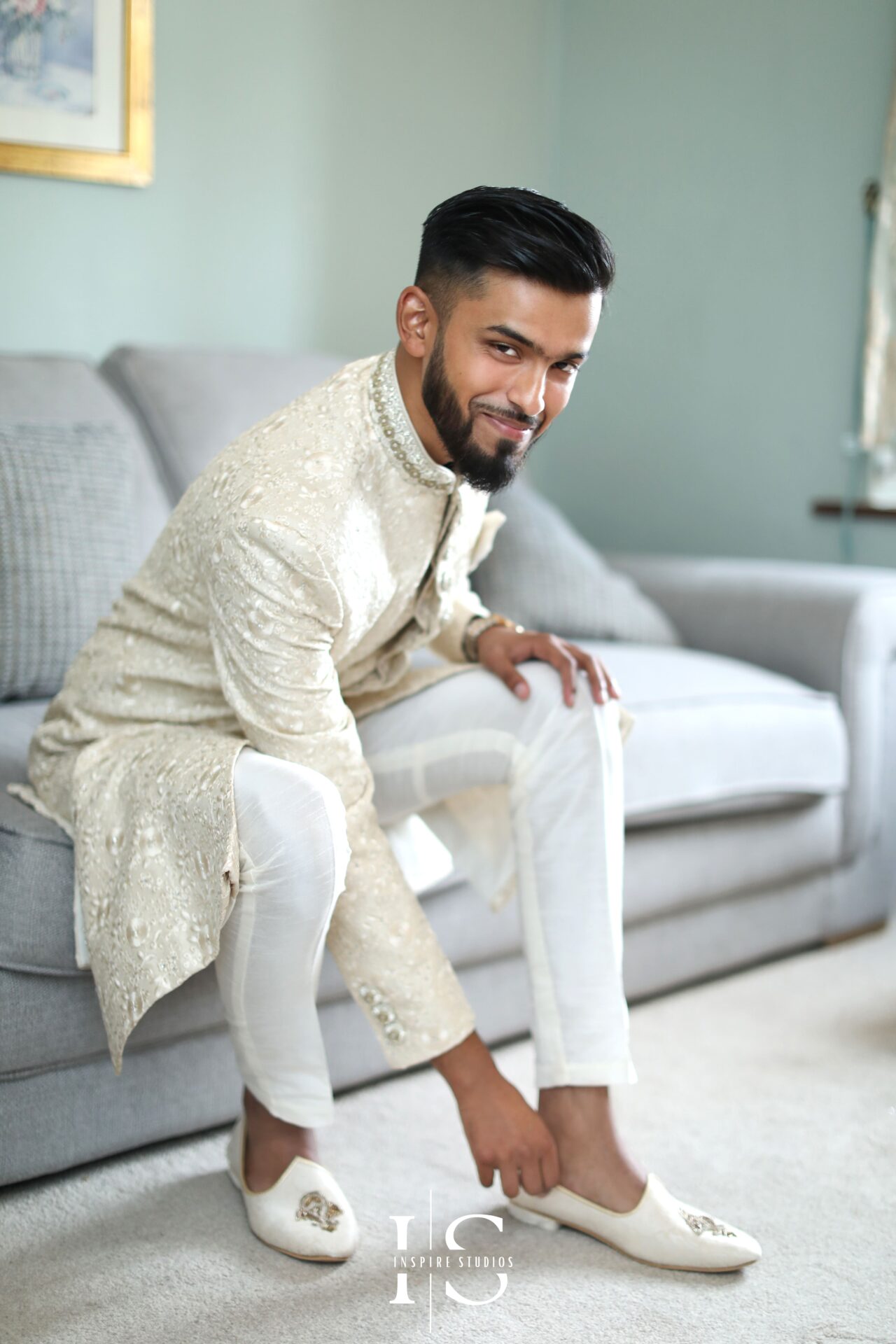 Baraat photographer in London capturing groom getting ready.