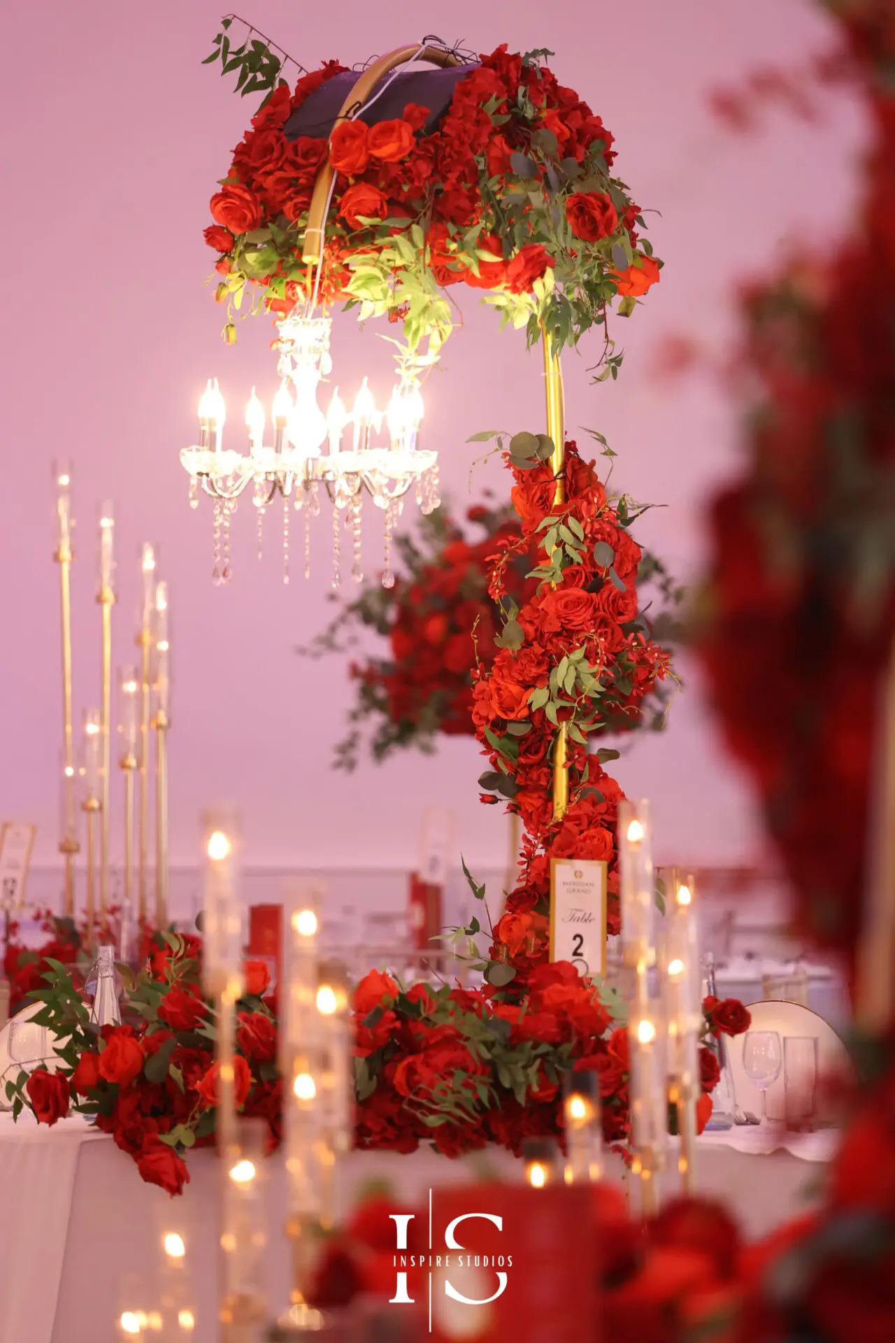 Venue decorations with red for baraat wedding at Meridian Grand venue.