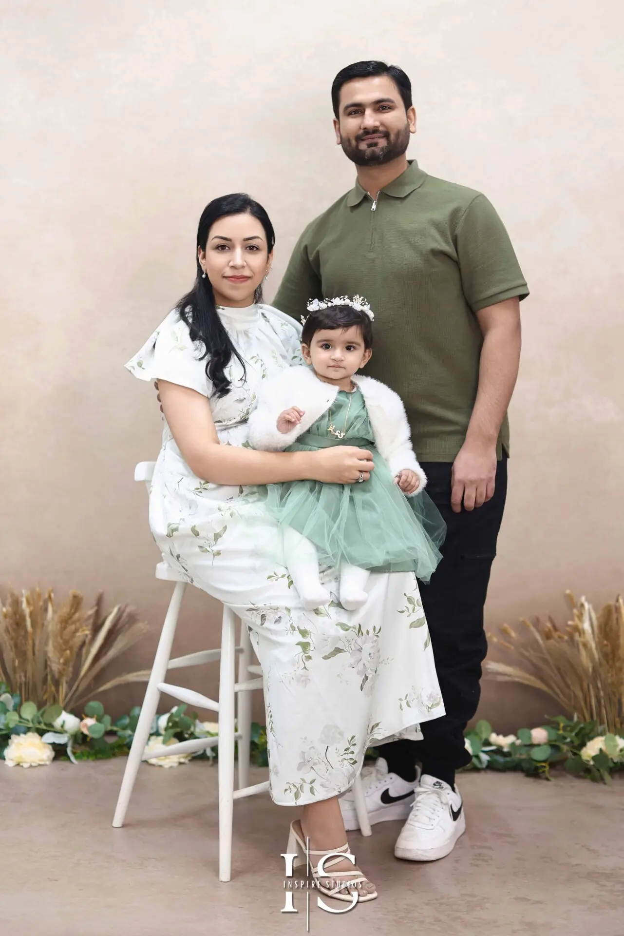 Baby enjoying a cake smash photoshoot in London for their first birthday.