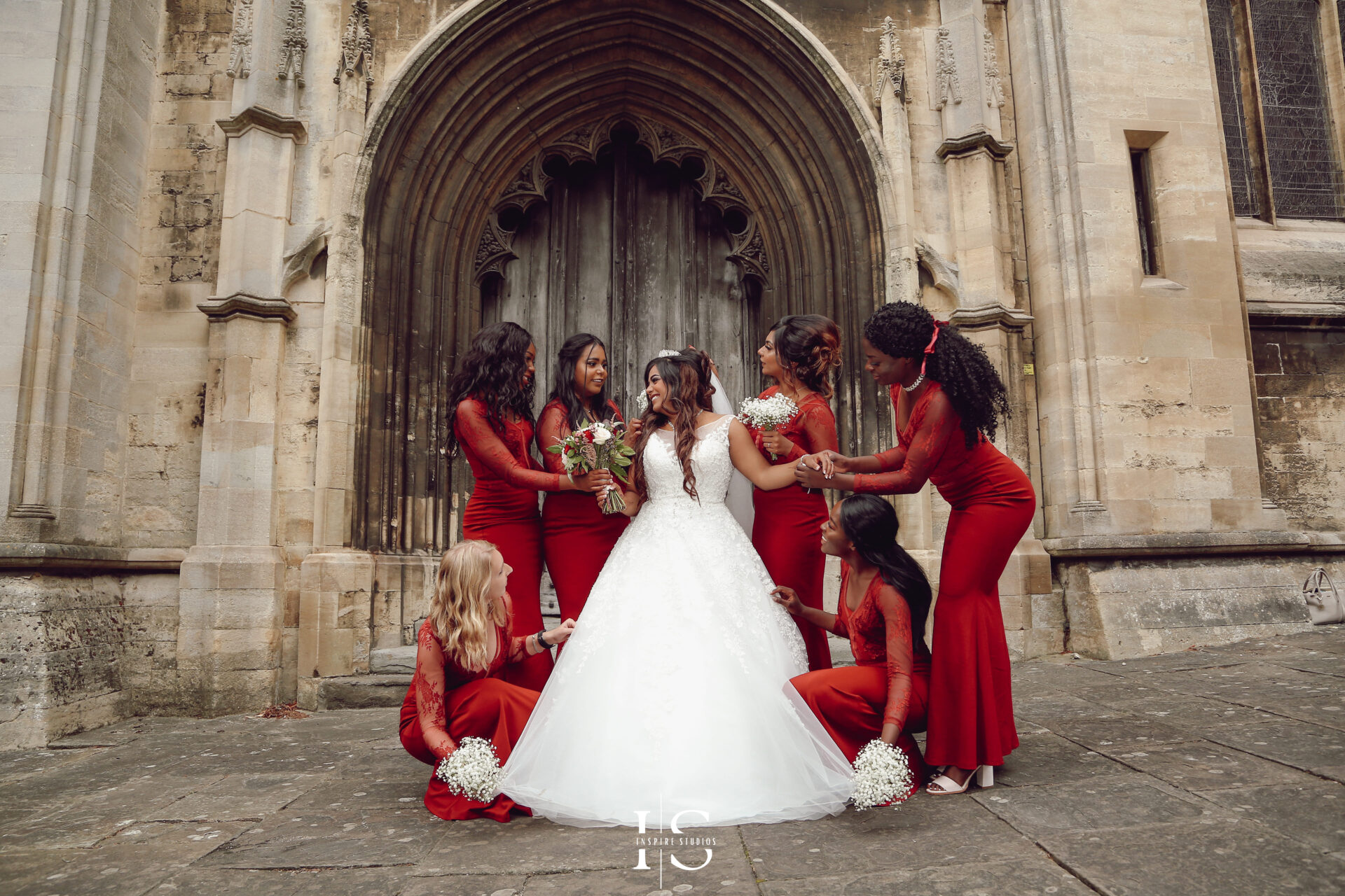 Bride and her bridesmaids captured during a church wedding in London.