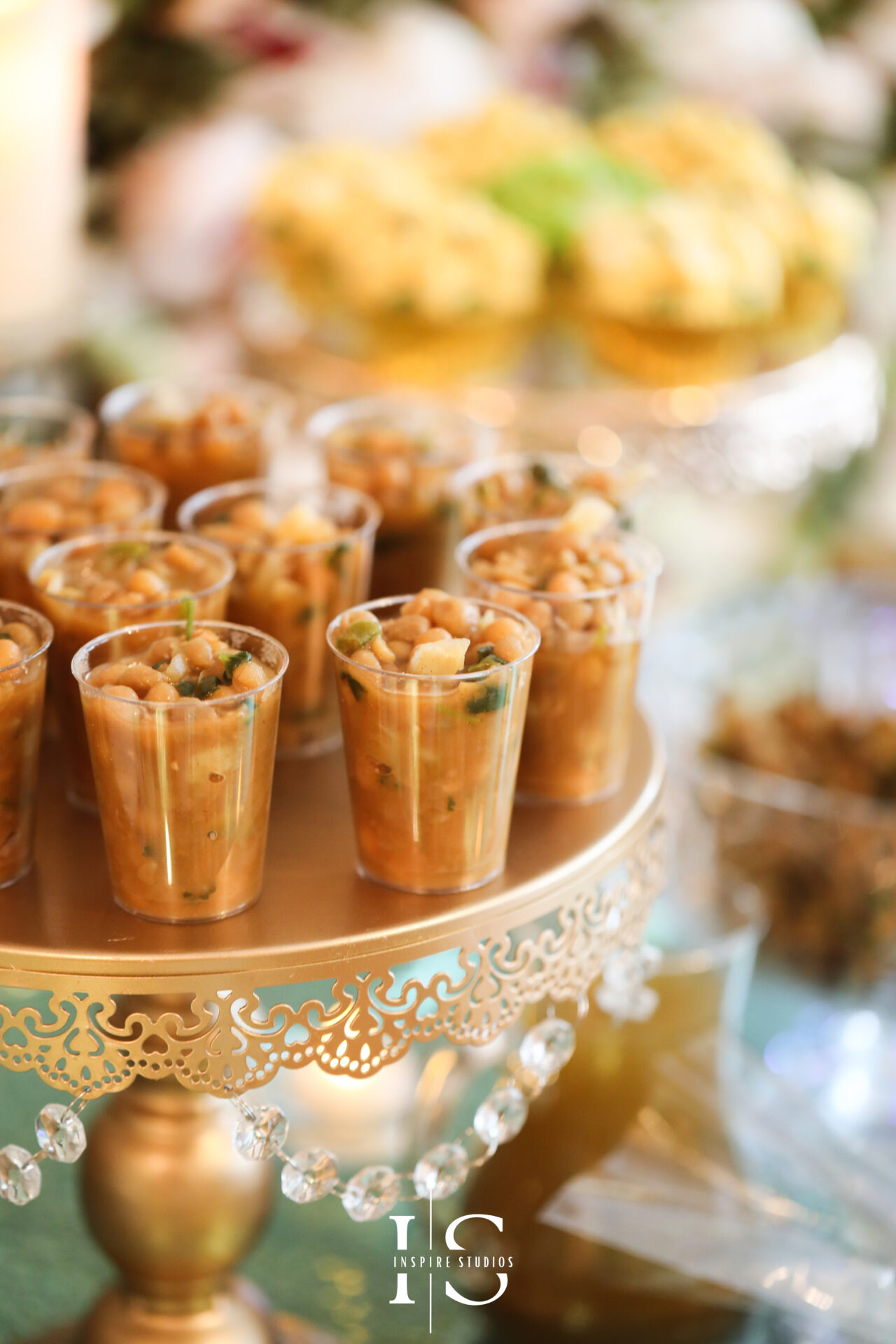 Mehndi Wedding Photography of Candy Bar with sweet dessert captured by mehndi female wedding photographer in London.