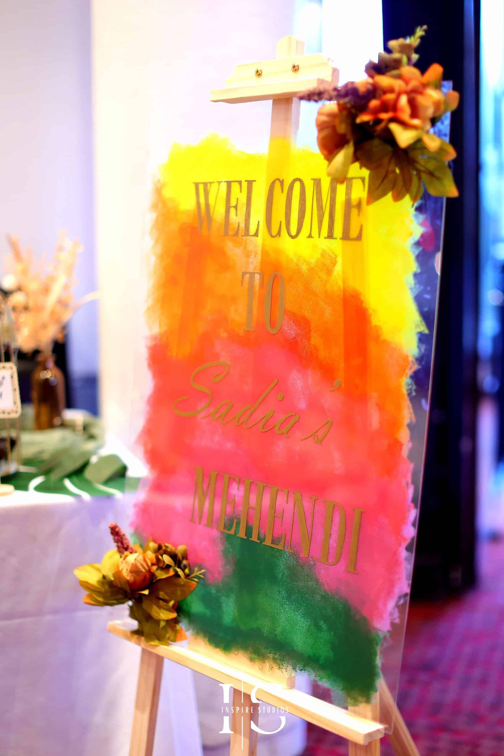 Welcoming board for Mehndi Wedding Photography to dholki area.