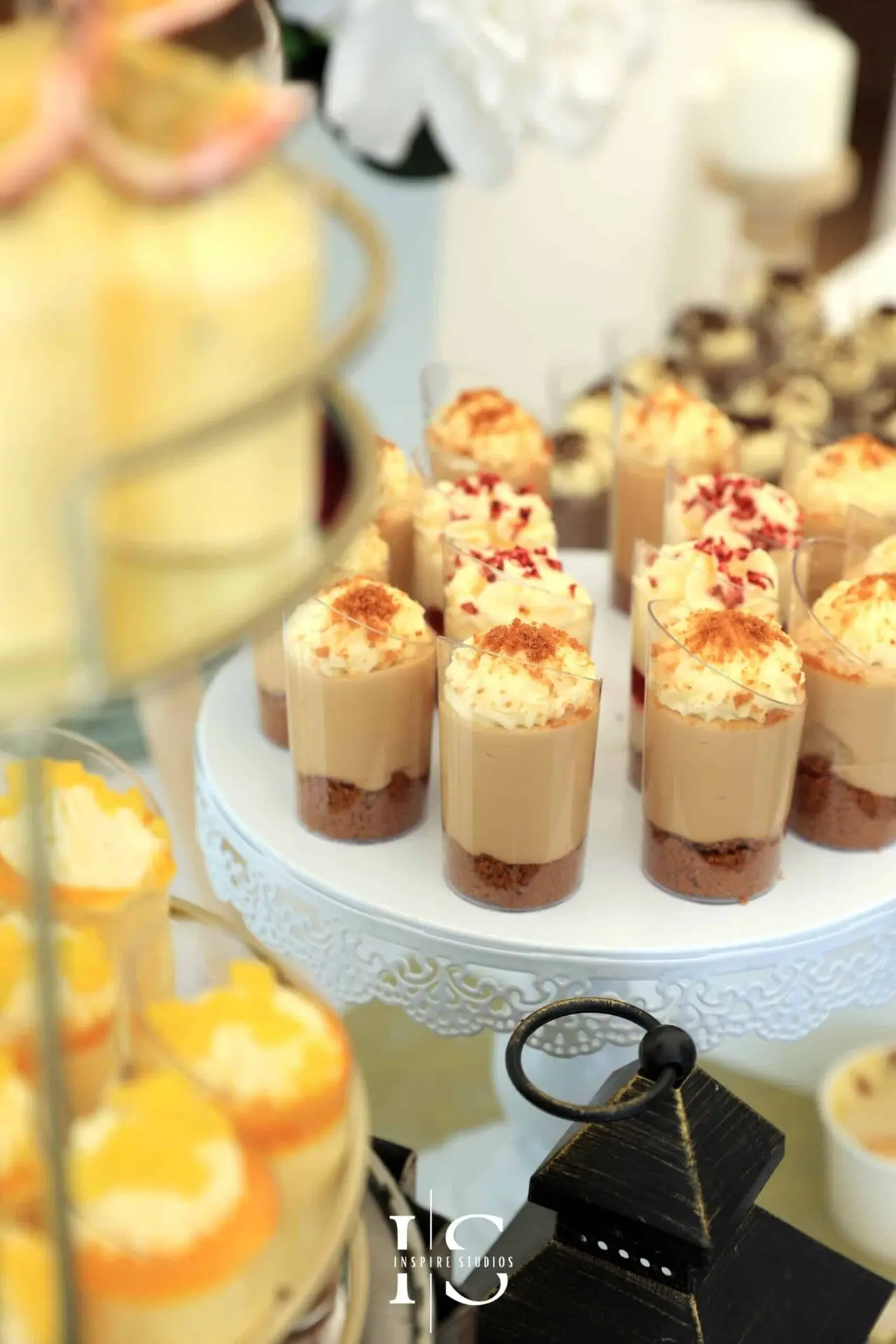 Mehndi Wedding Photography of Candy Bar with sweet dessert captured by mehndi female wedding photographer in London.