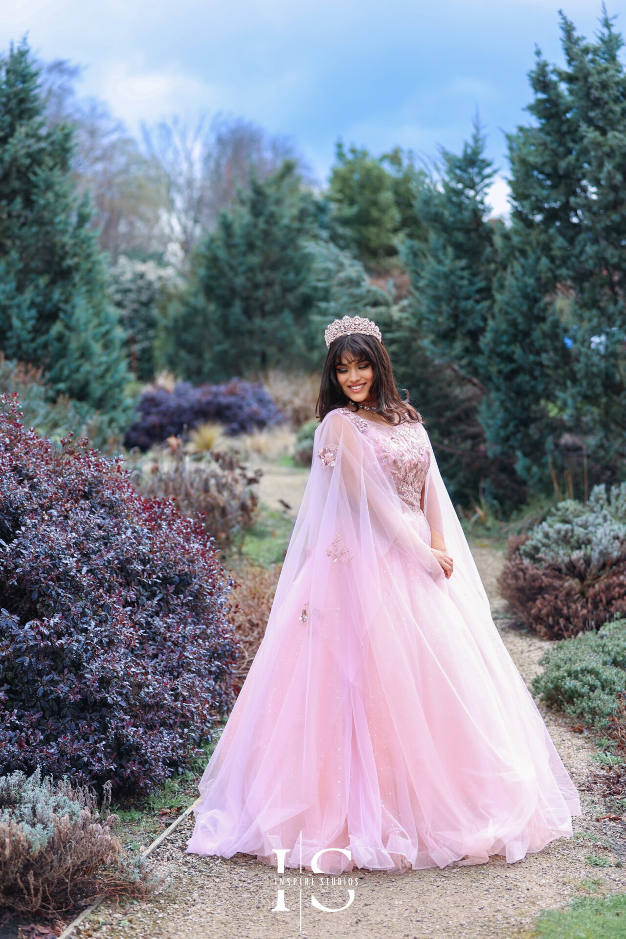 Outdoor birthday photoshoot in London featuring a birthday celebration in Valentines Park’s scenic surroundings.