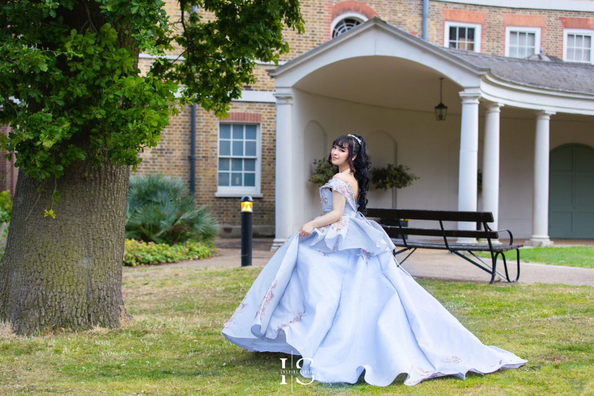 Outdoor prom photoshoot in London with a natural and scenic park backdrop, highlighting elegance and style.