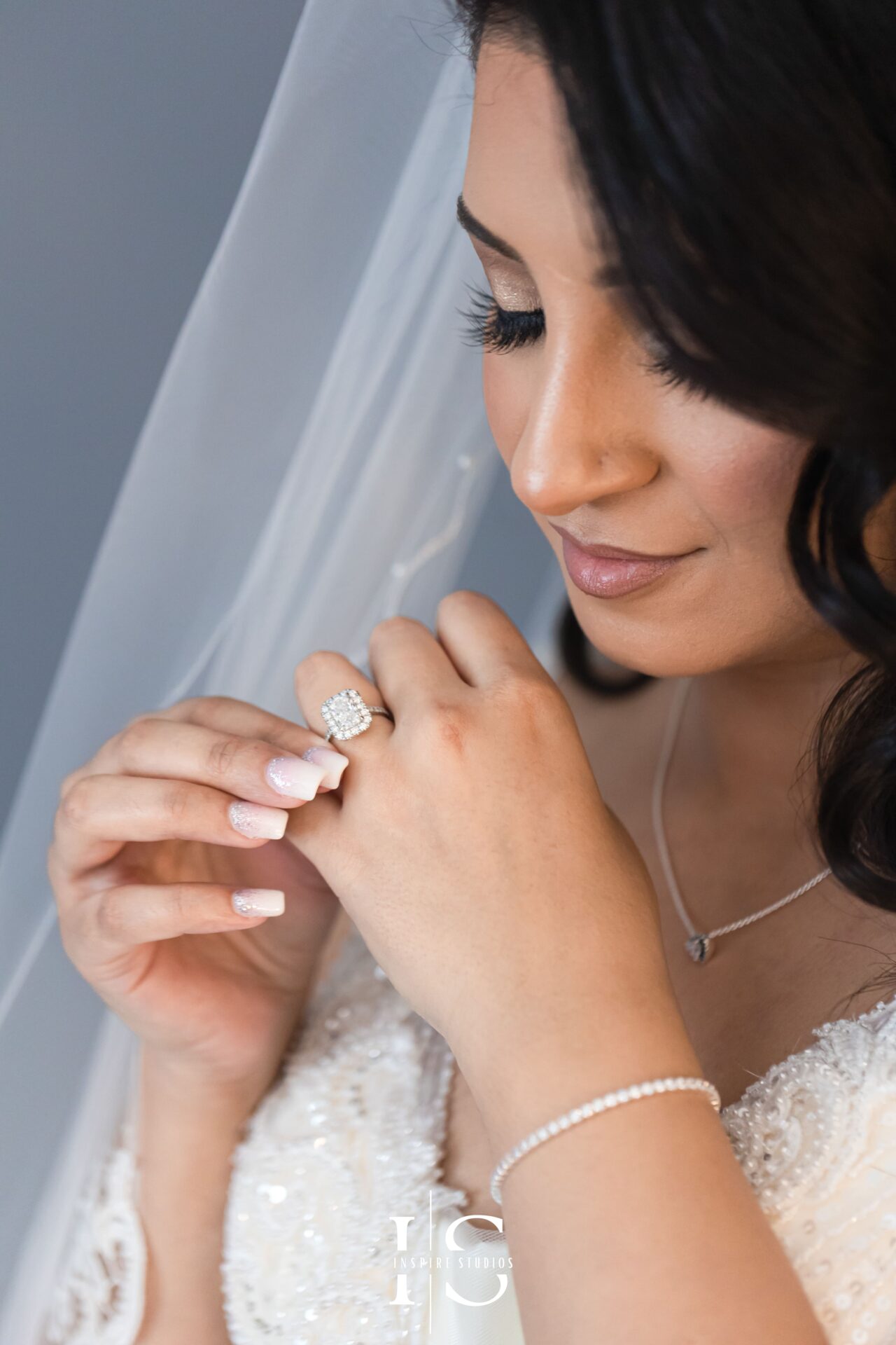 Bride getting ready before registry ceremony in London.