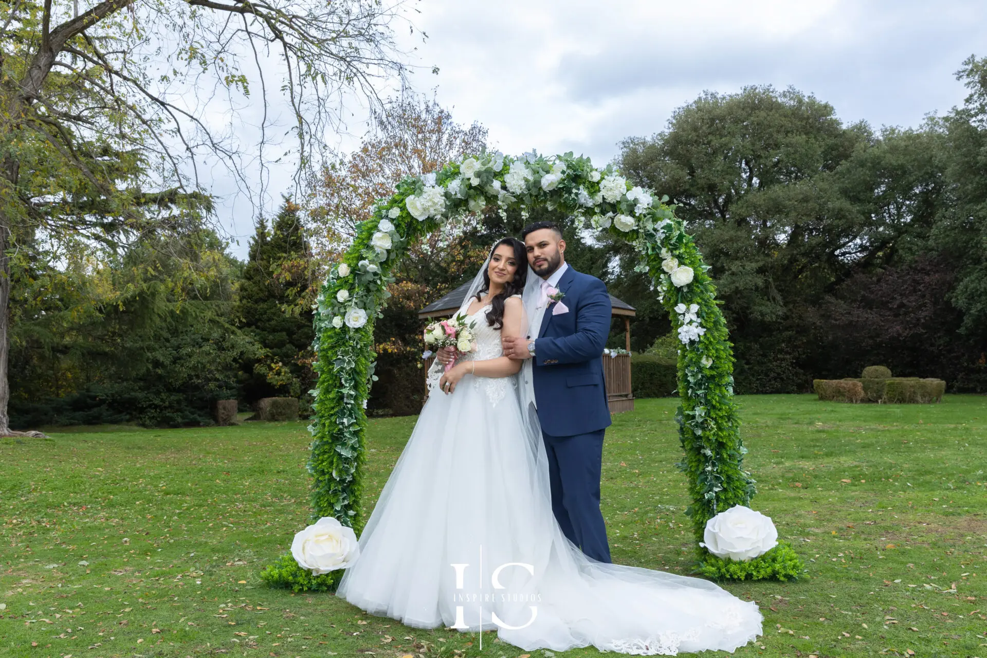 Registry wedding photographer in London capturing intimate garden wedding ceremony and couple portraits