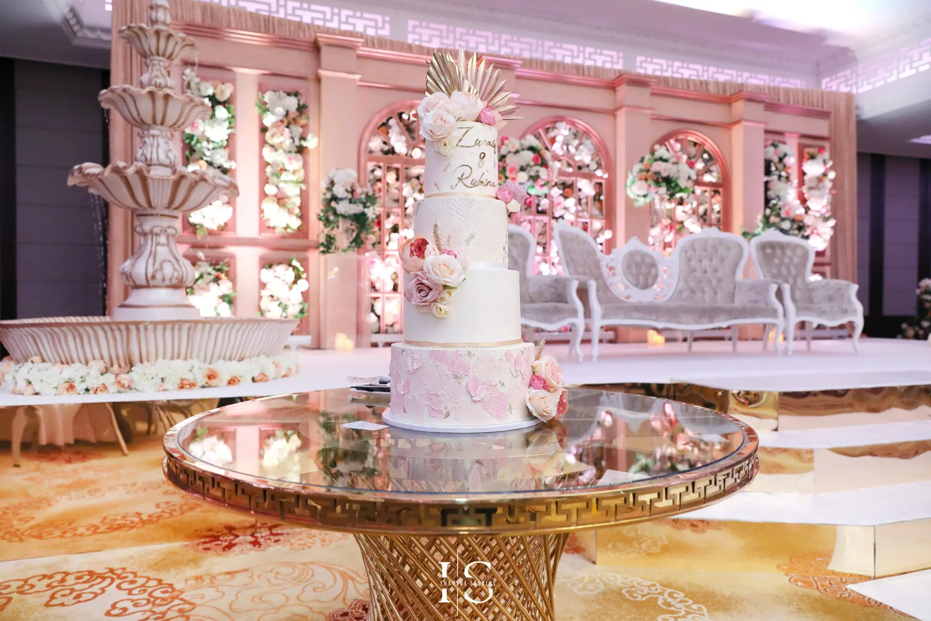 Beautifully decorated cake captured by walima female wedding photographer in London.