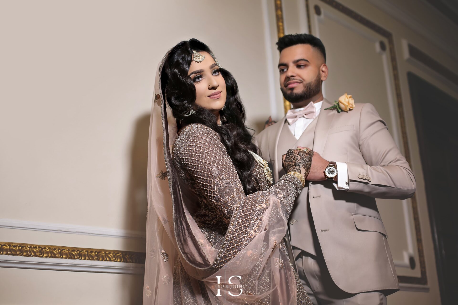 Elegant bride and groom during a Walima photoshoot, captured by a London wedding photographer at Inspire Studios.