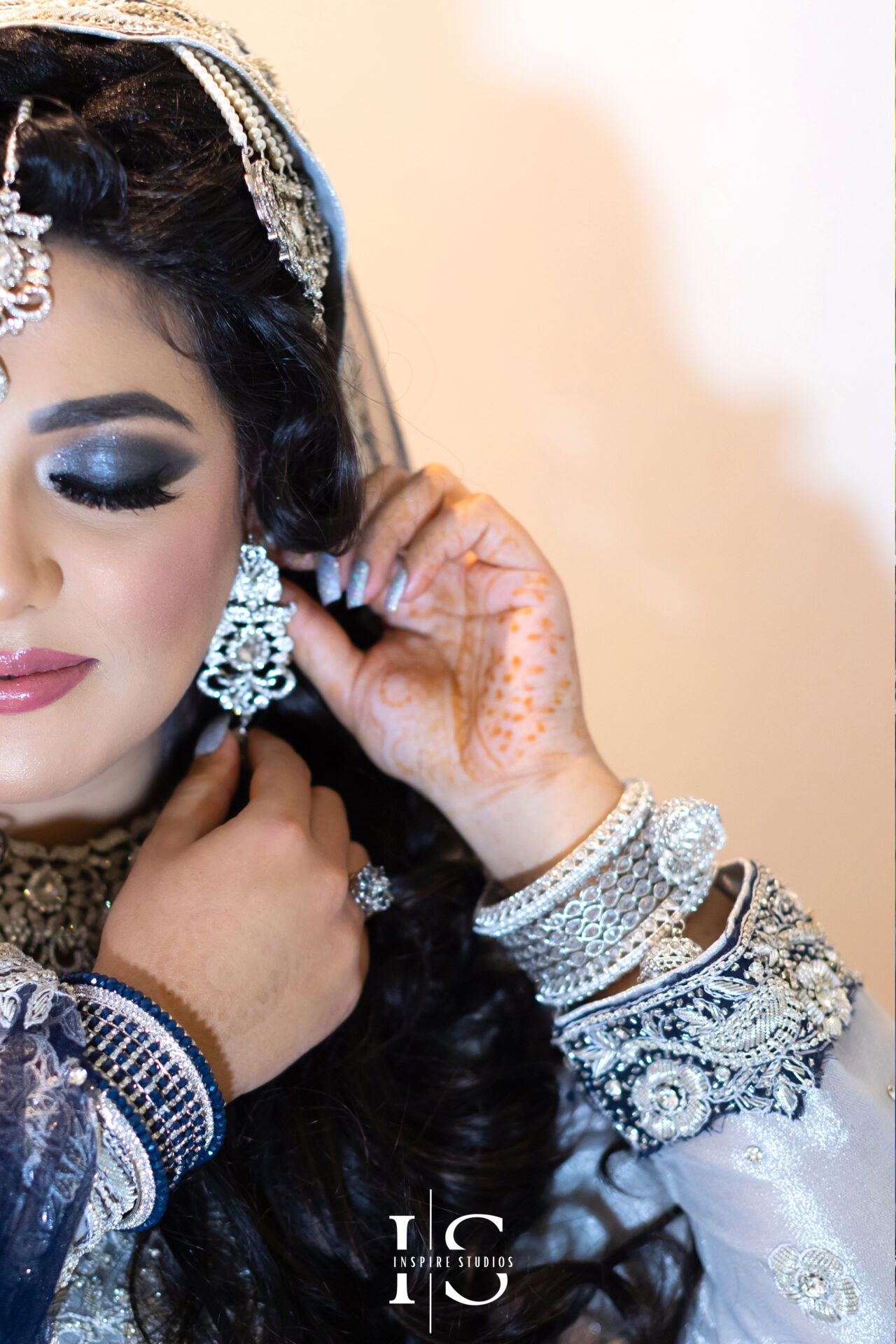 Walima wedding photographer London capturing the couple's beautiful wedding day moments, including bride and groom getting ready.