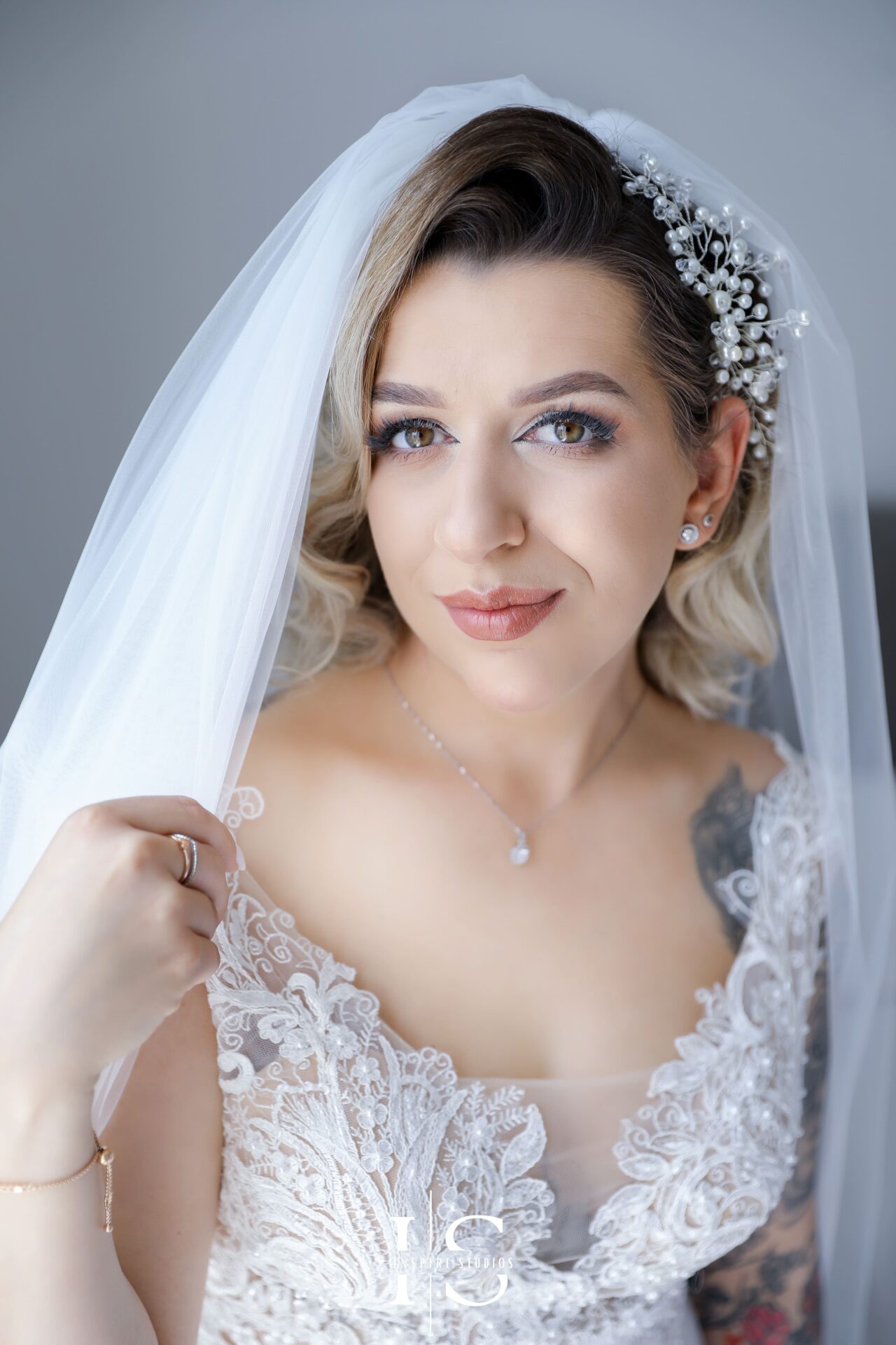 Female wedding photographer capturing bride's smile during her wedding day in London.