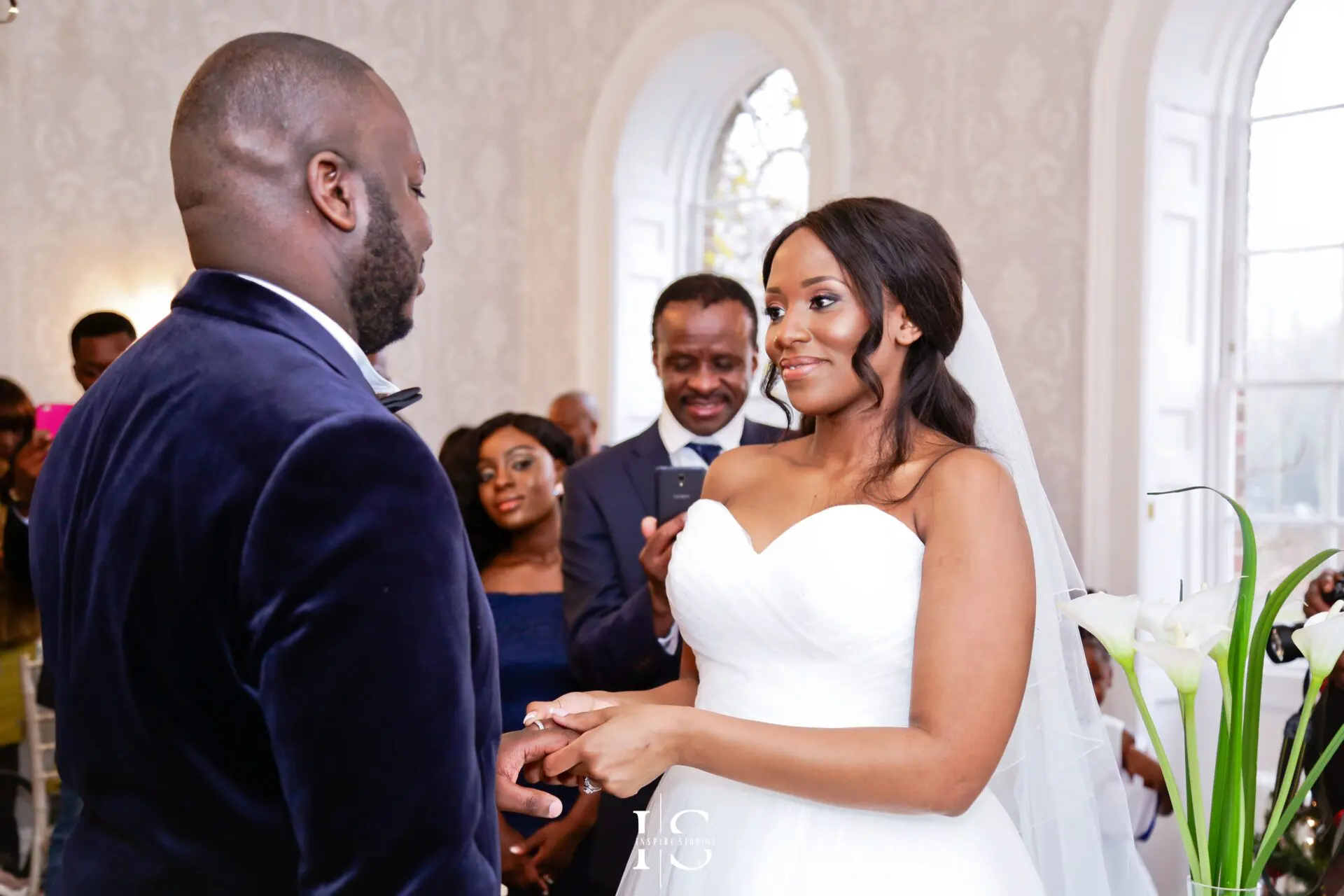 Registry office photographer in London capturing couple outside ceremony venue