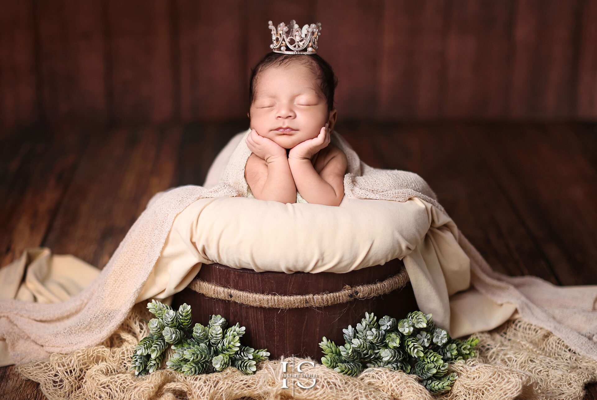 Experienced female newborn photographer in London capturing delicate and timeless baby portraits.