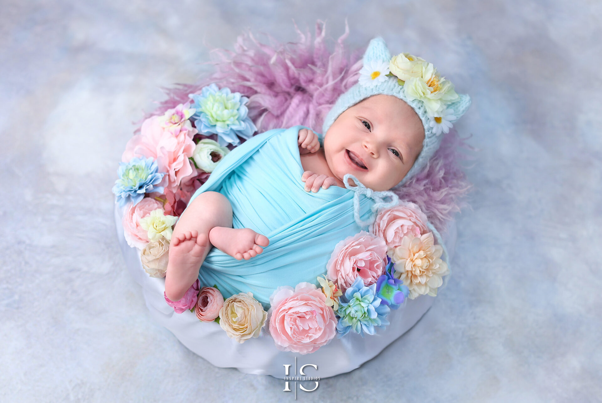 Professional newborn photography session in London – capturing precious moments of a baby girl.