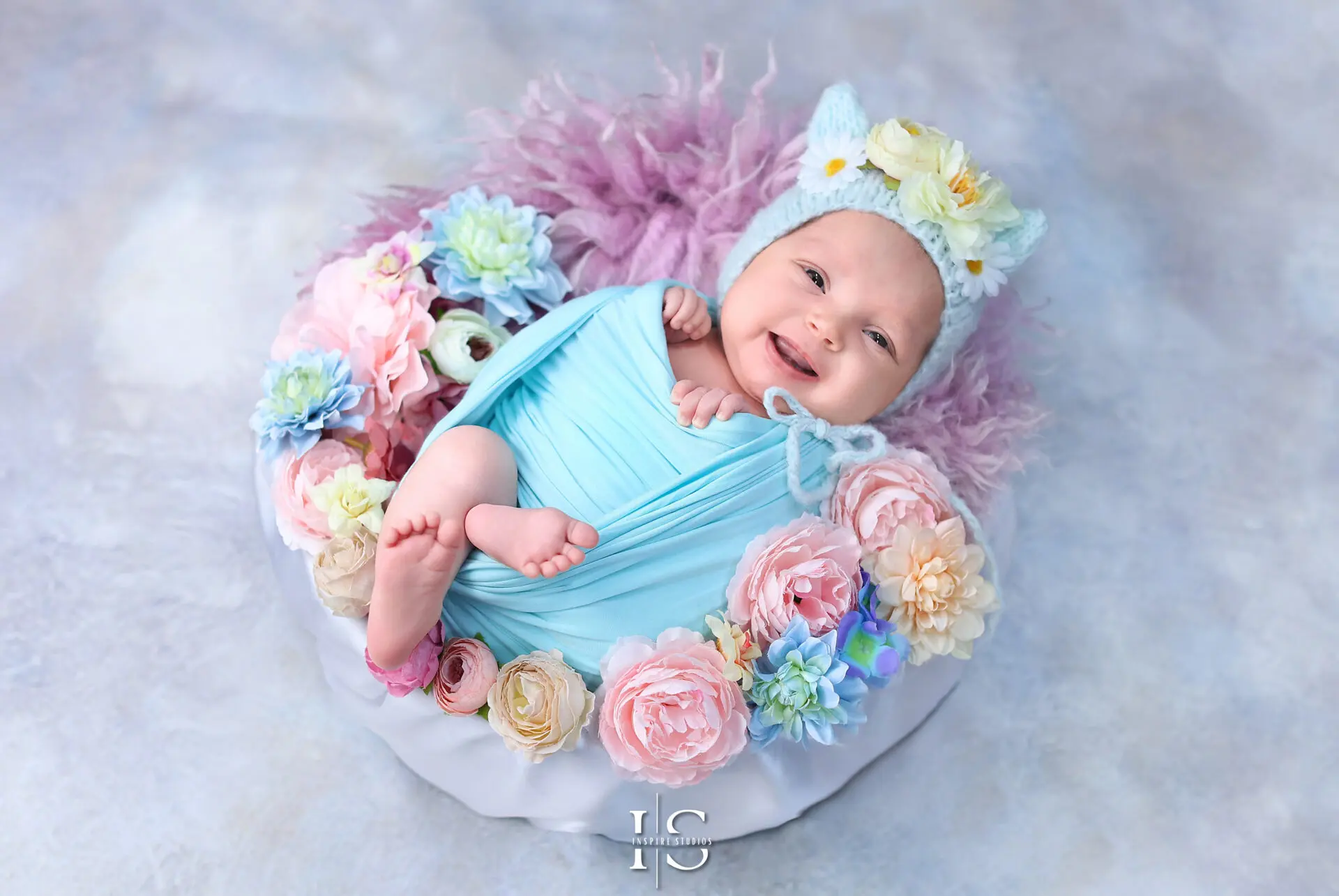Professional newborn photography session in London – capturing precious moments of a baby girl.