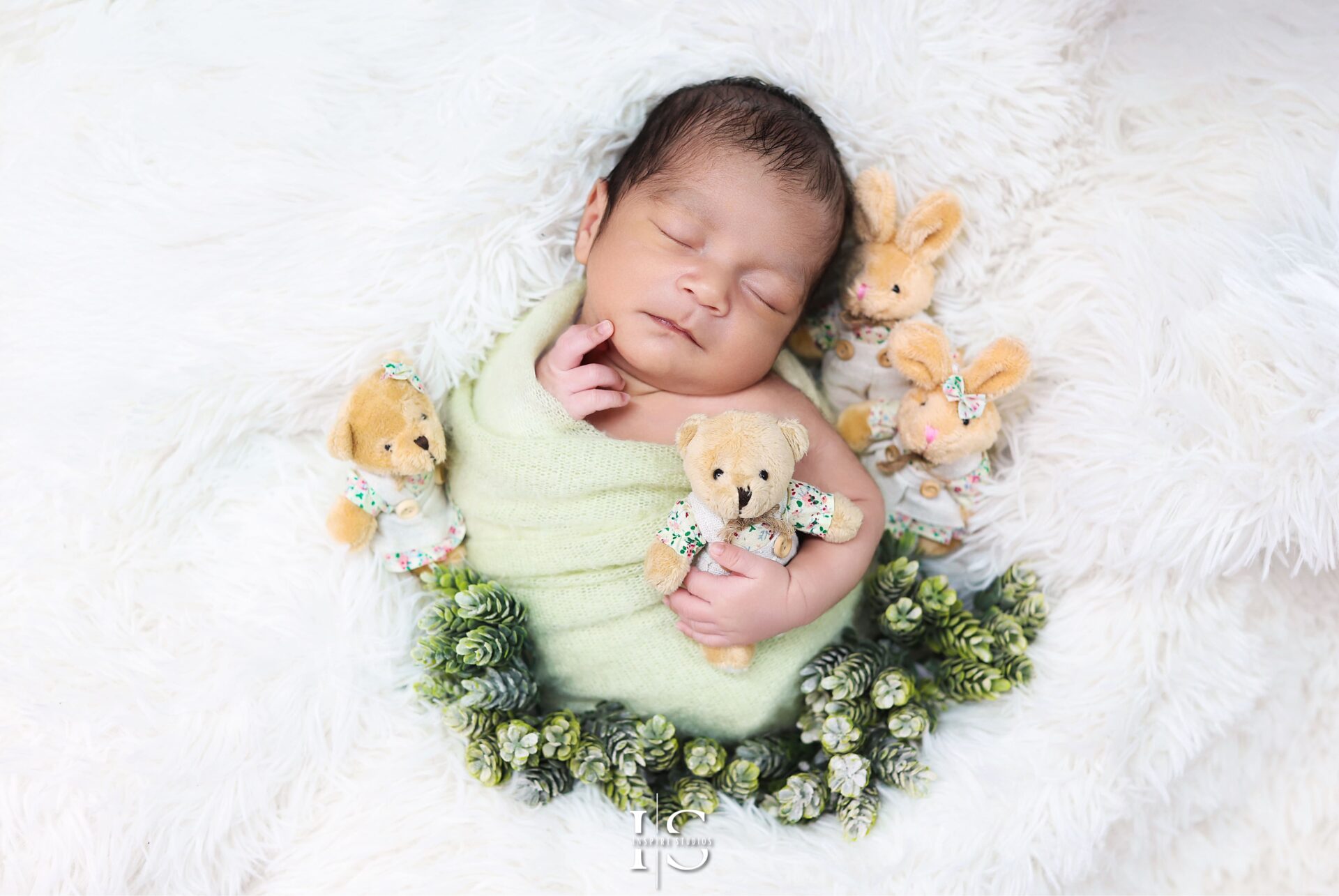 Peaceful sleeping newborn captured in a professional London photography studio.