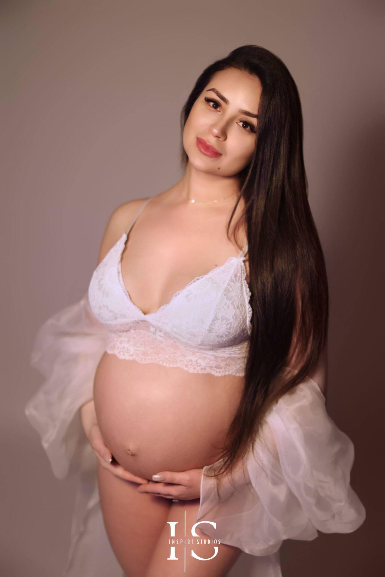 Capture timeless pregnancy moments with a studio maternity photoshoot in London.