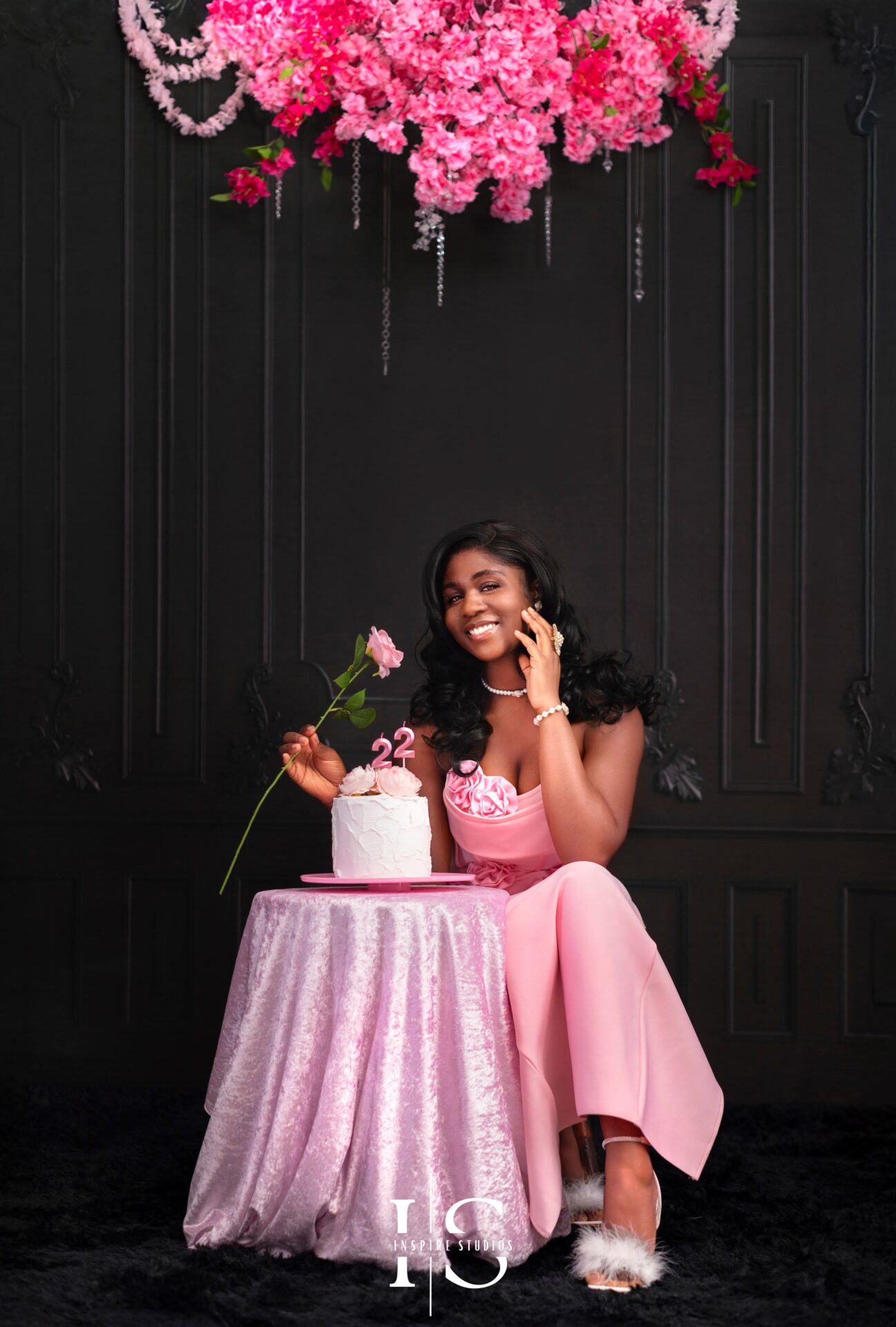 Celebrate love with a stunning Valentine’s Mini Session featuring a black Victorian wall and pink florals.