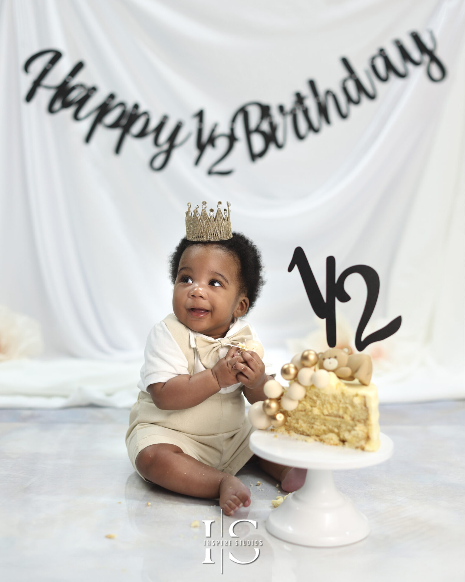 Six-month-old baby posing in a professional studio photoshoot in London.