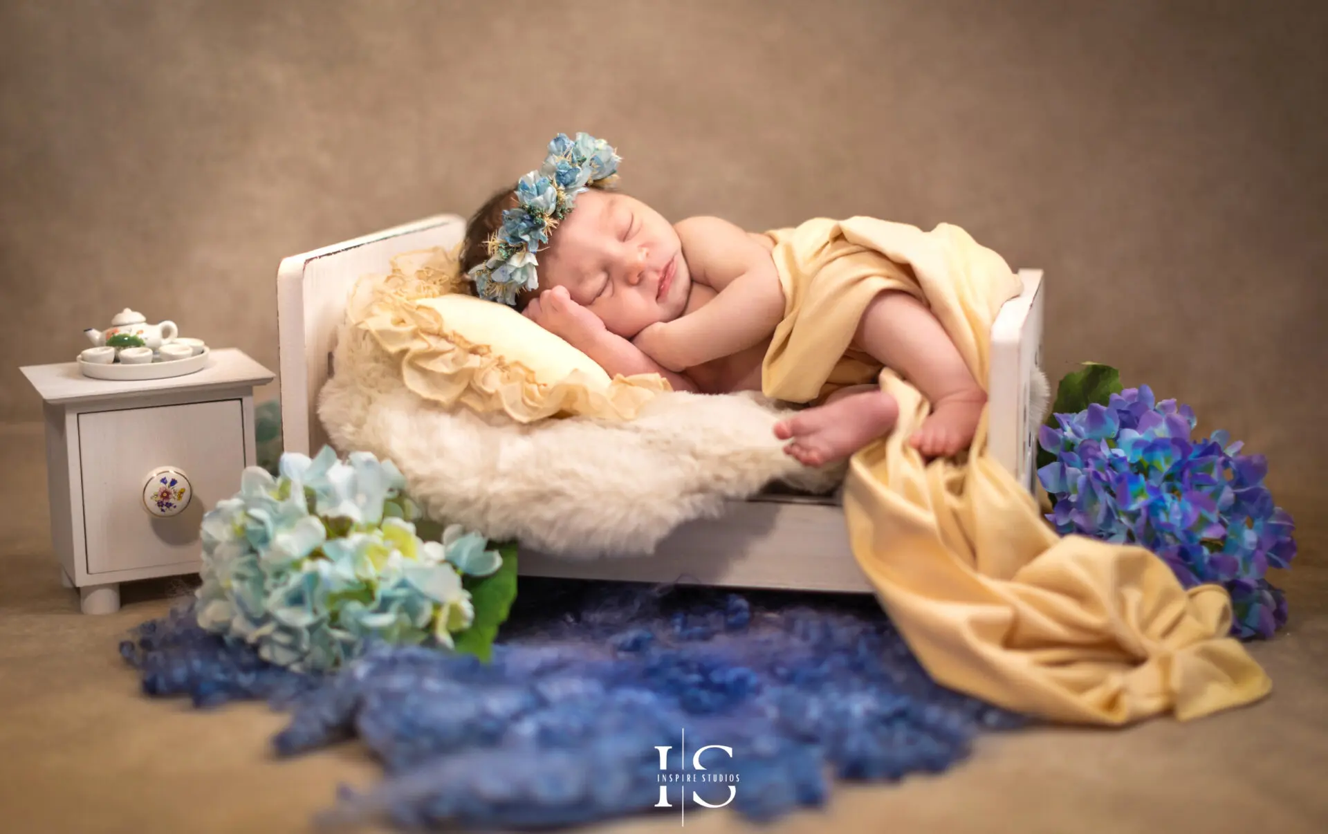 Newborn baby girl in a delicate pose during her Walthamstow photoshoot.