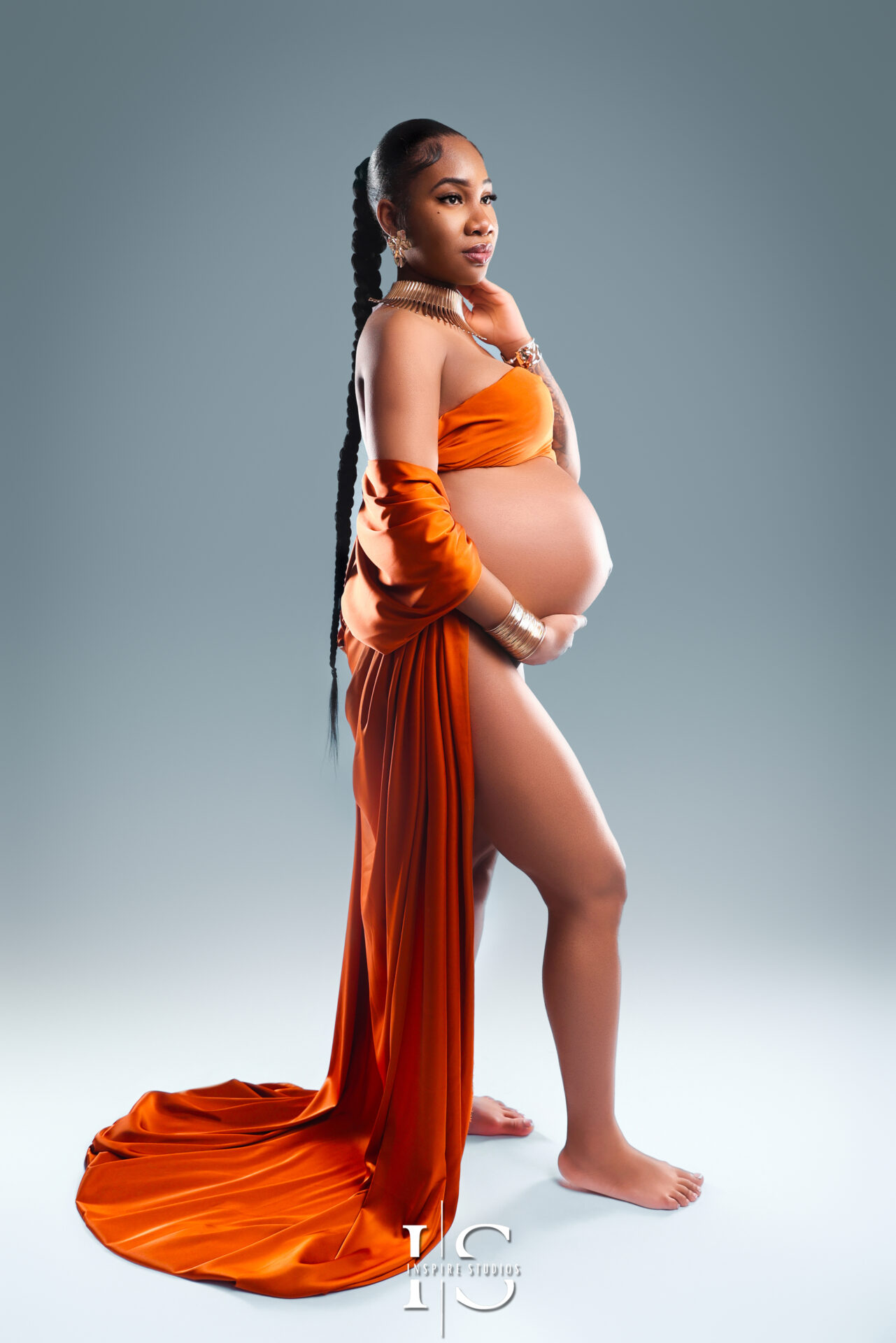 Elegant maternity photography in Walthamstow, featuring a mother-to-be in a soft, glowing light.