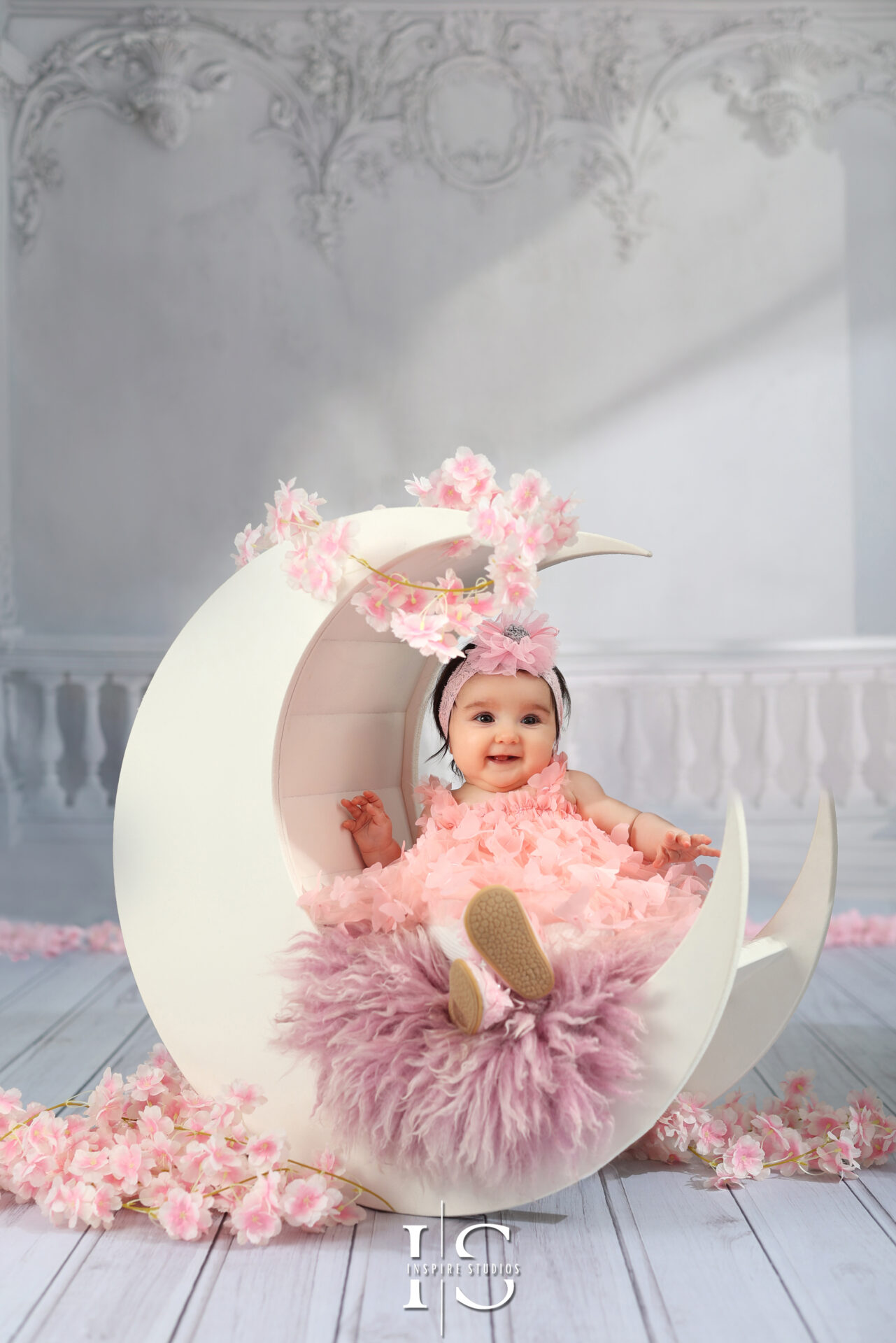 Baby sitter girl posing in a studio london.
