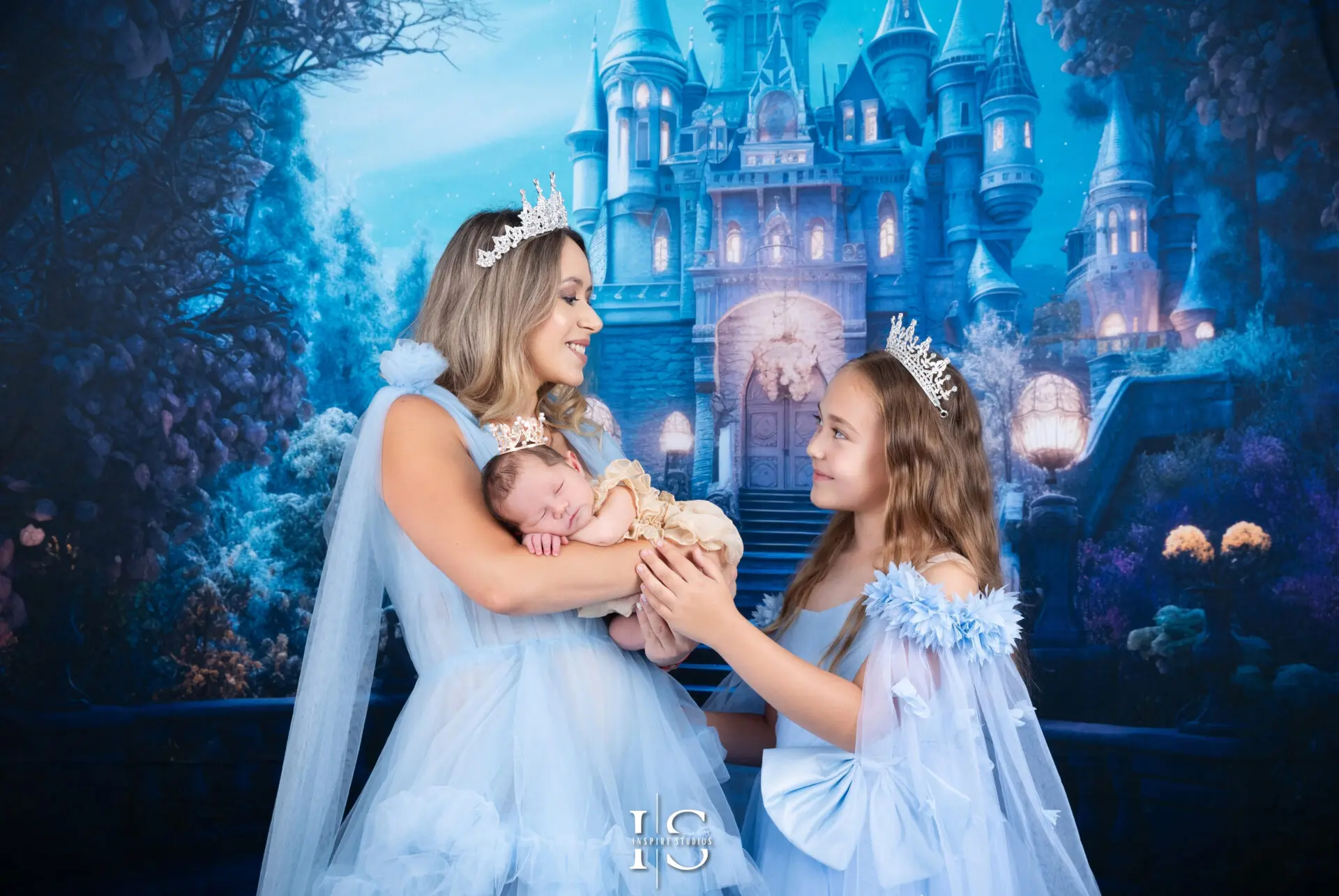 Elegant Cinderella-themed studio session in London, celebrating maternity and newborn moments.
