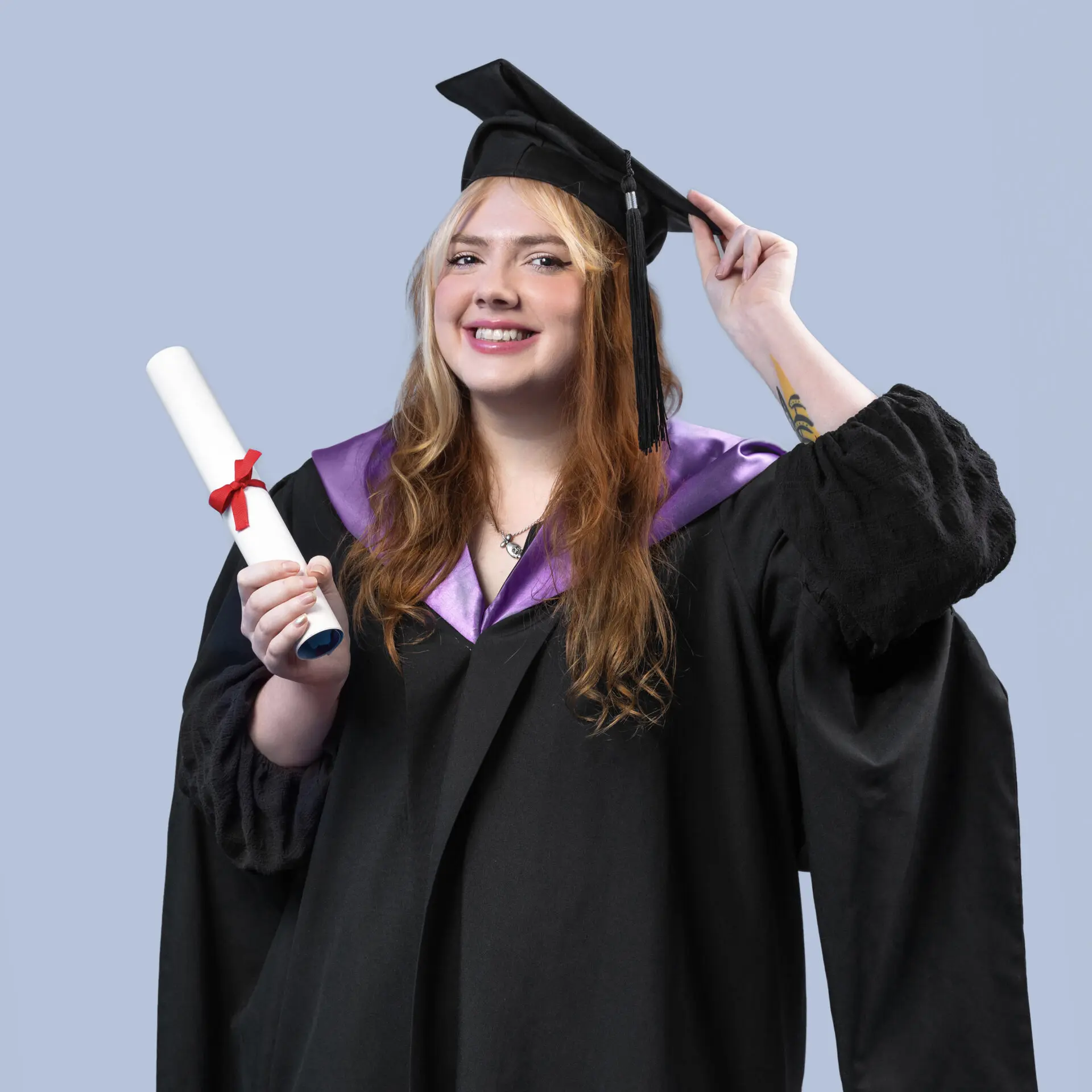 London studio graduation photoshoot with family and diploma