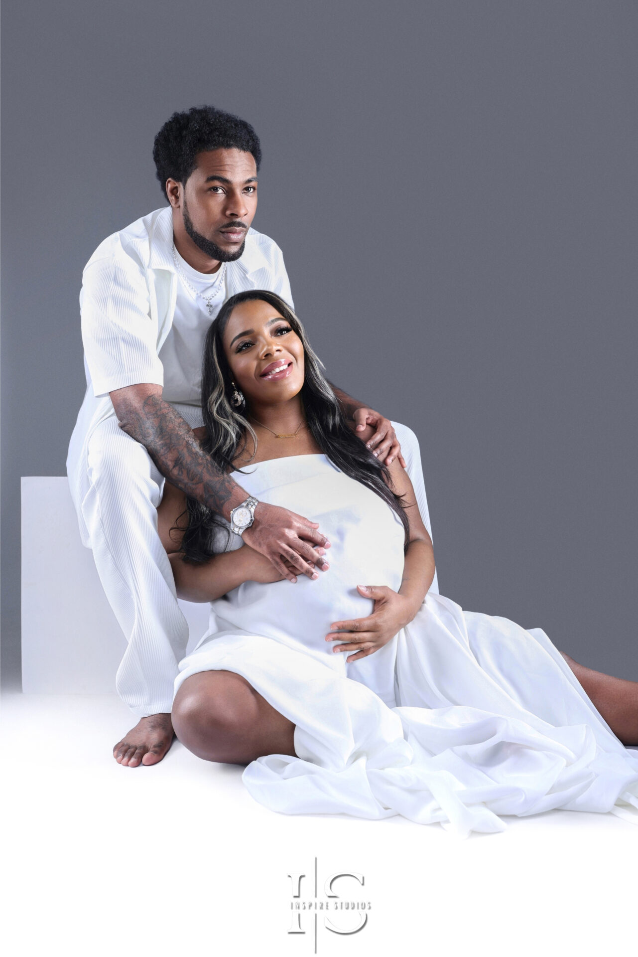 Stylish maternity photoshoot inside a professional London studio.