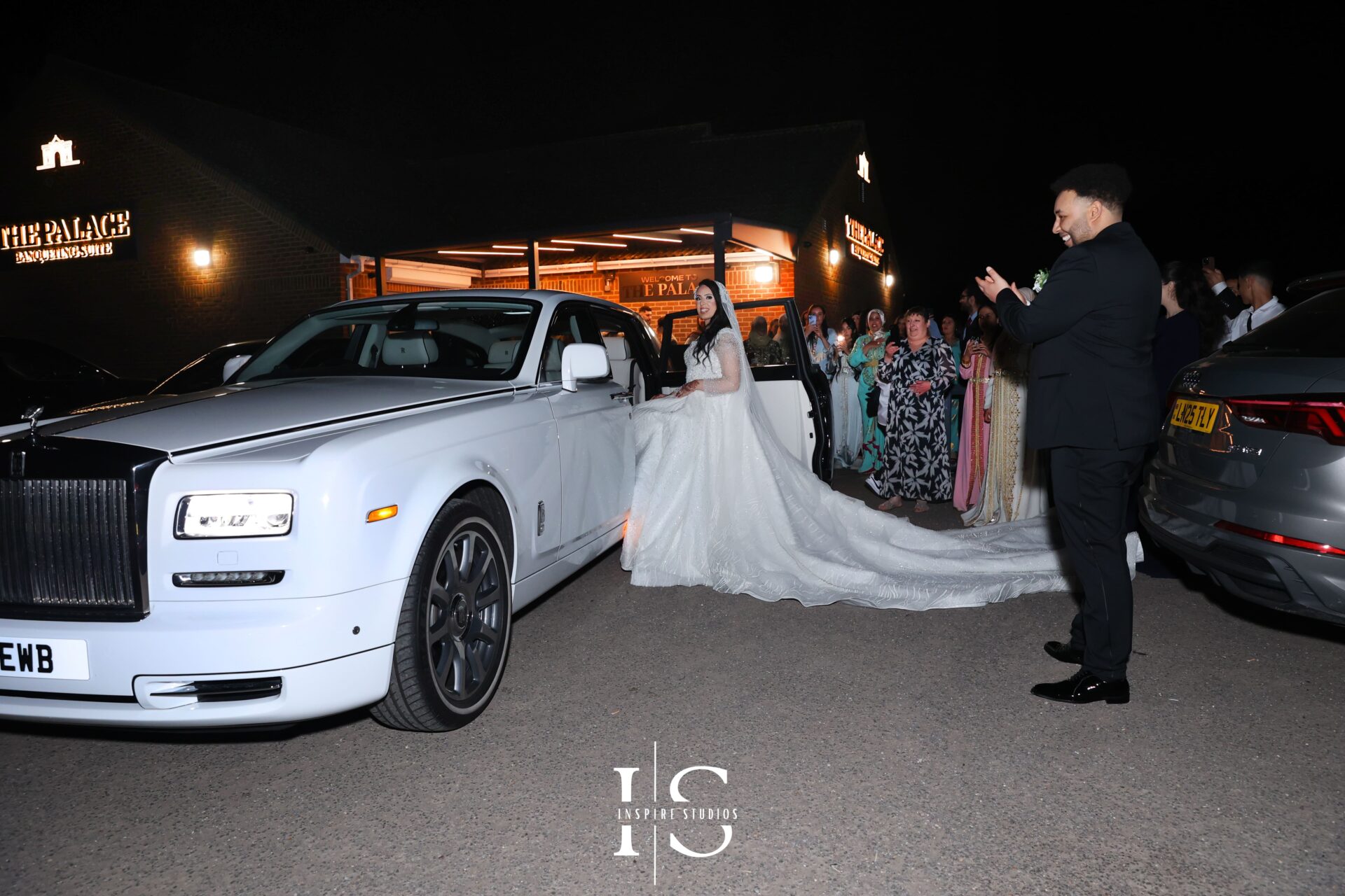 Moroccan bride sharing a laugh with her female photographer