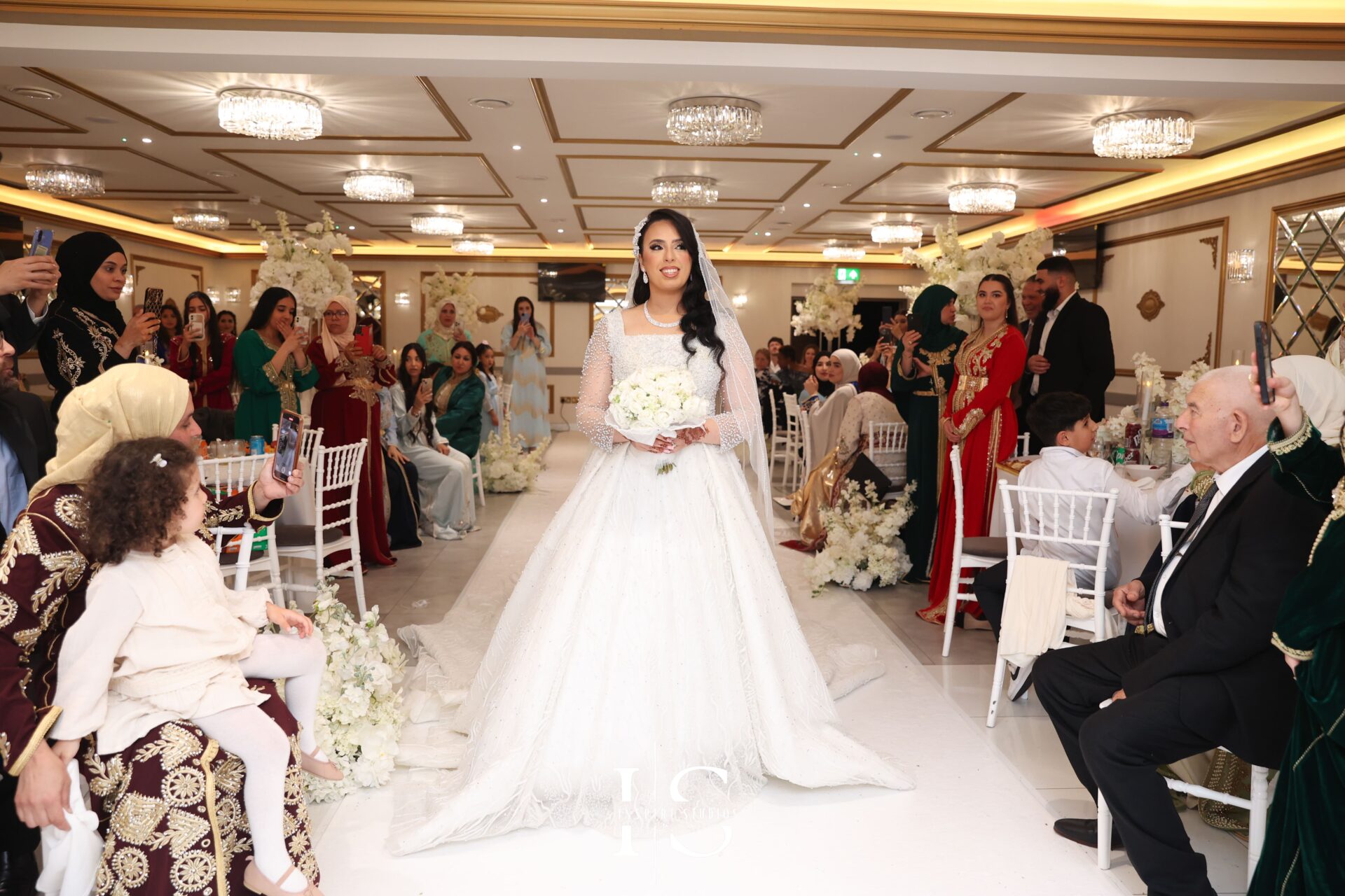 Moroccan bride in a golden caftan at London wedding