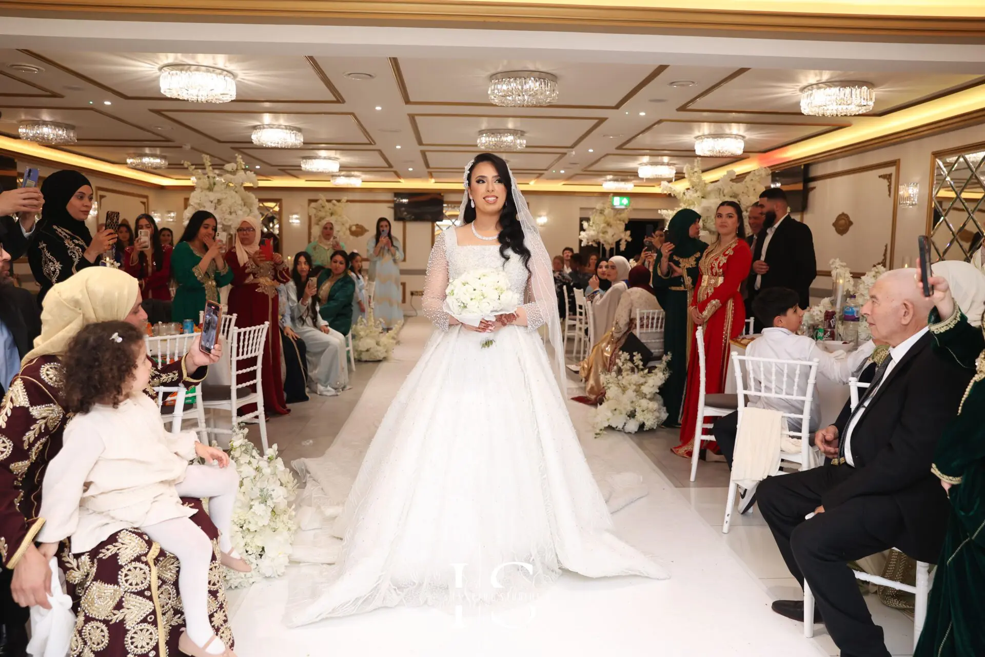 Moroccan bride in a golden caftan at London wedding